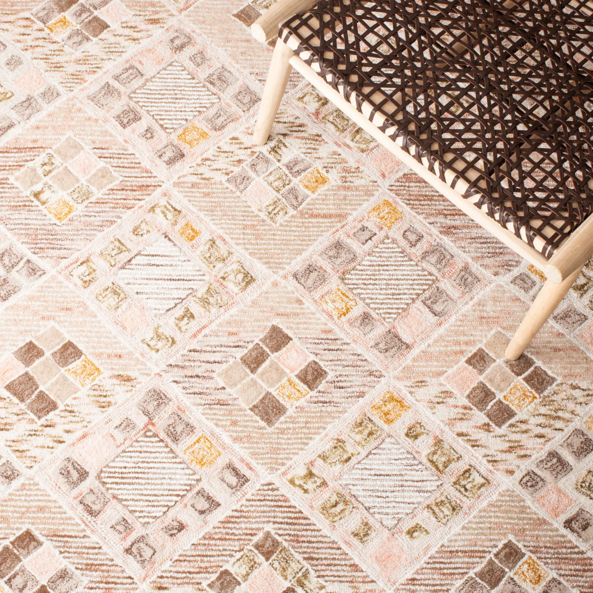 Soho Diamond Lattice Hand-Tufted Wool Rug in Pink / Taupe in a styled room
