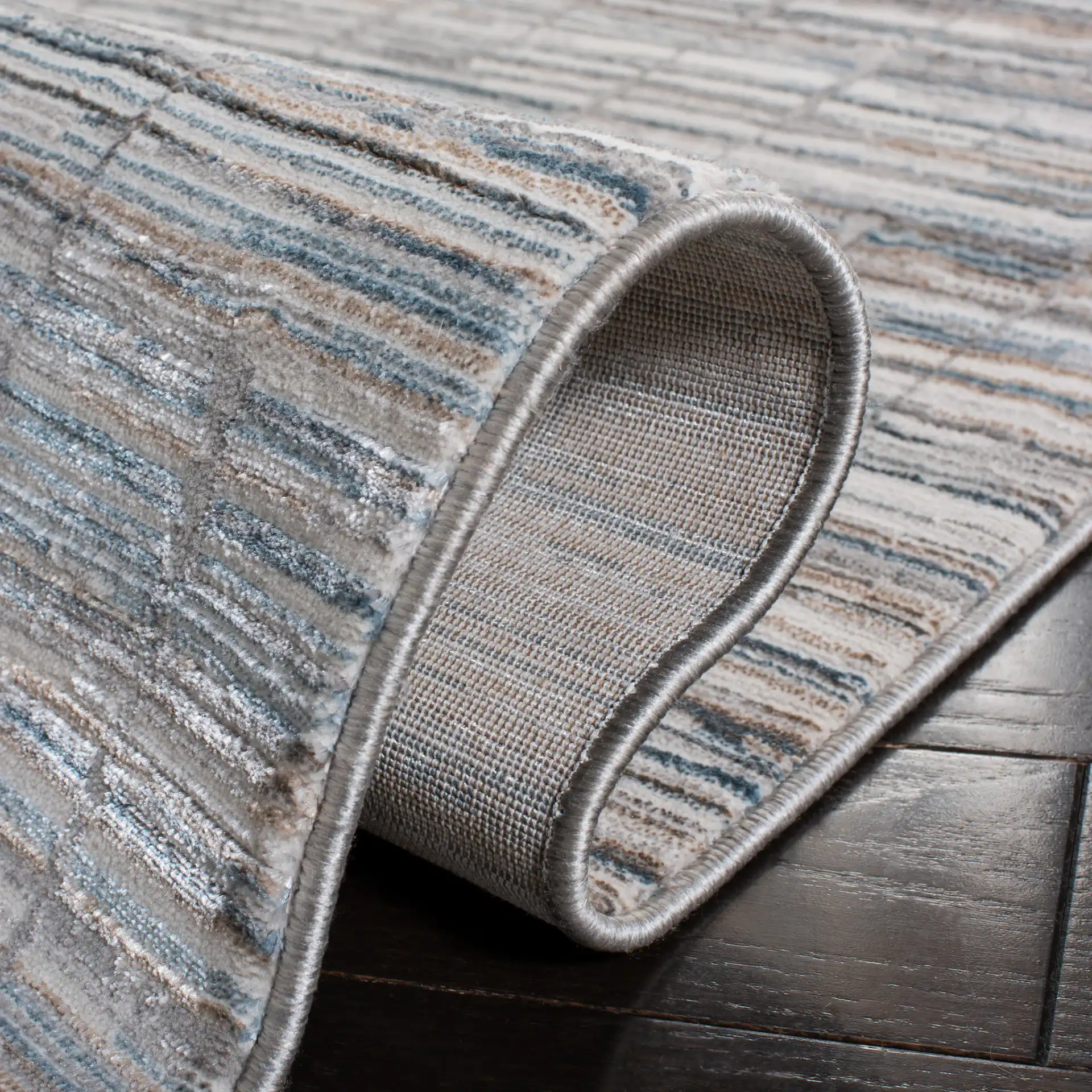 Sonoma Linear Grid Rug in Gray / Ivory in a styled room
