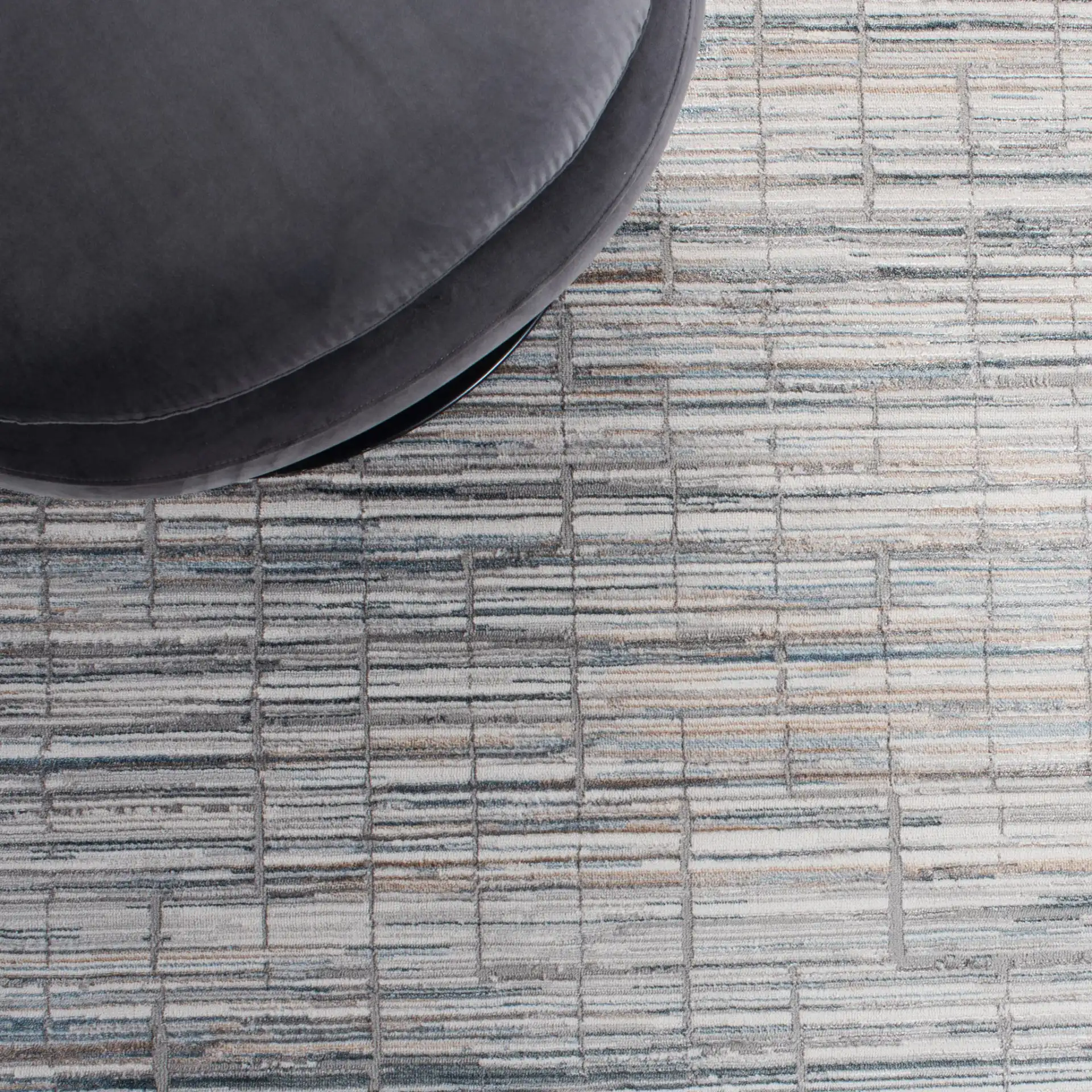 Sonoma Linear Grid Rug in Gray / Ivory in a styled room
