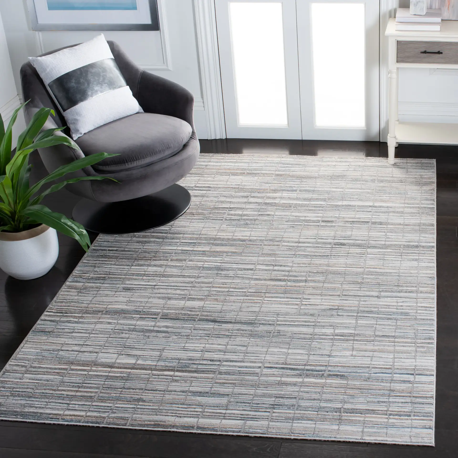 Sonoma Linear Grid Rug in Gray / Ivory in a styled room