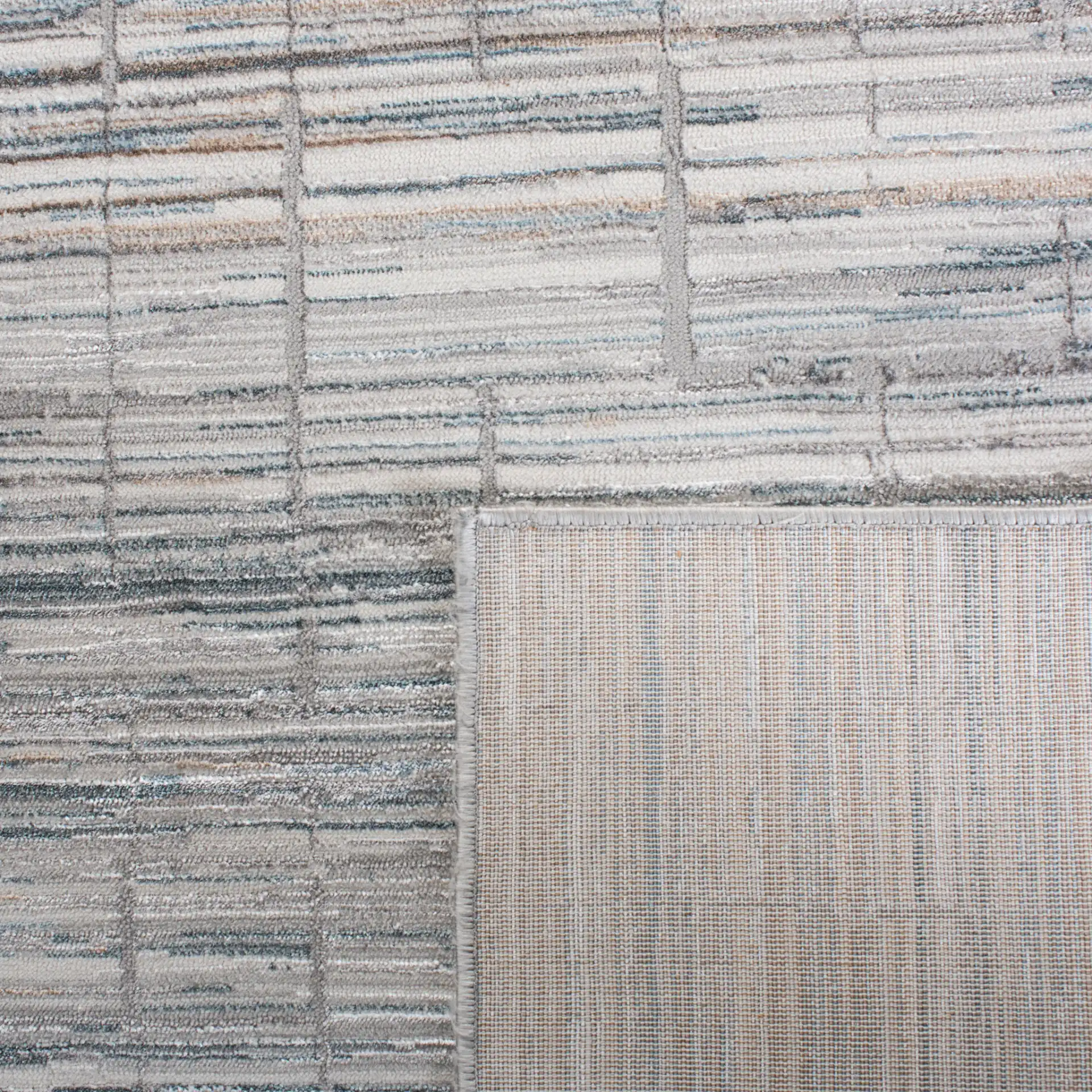 Sonoma Linear Grid Rug in Gray / Ivory in a styled room
