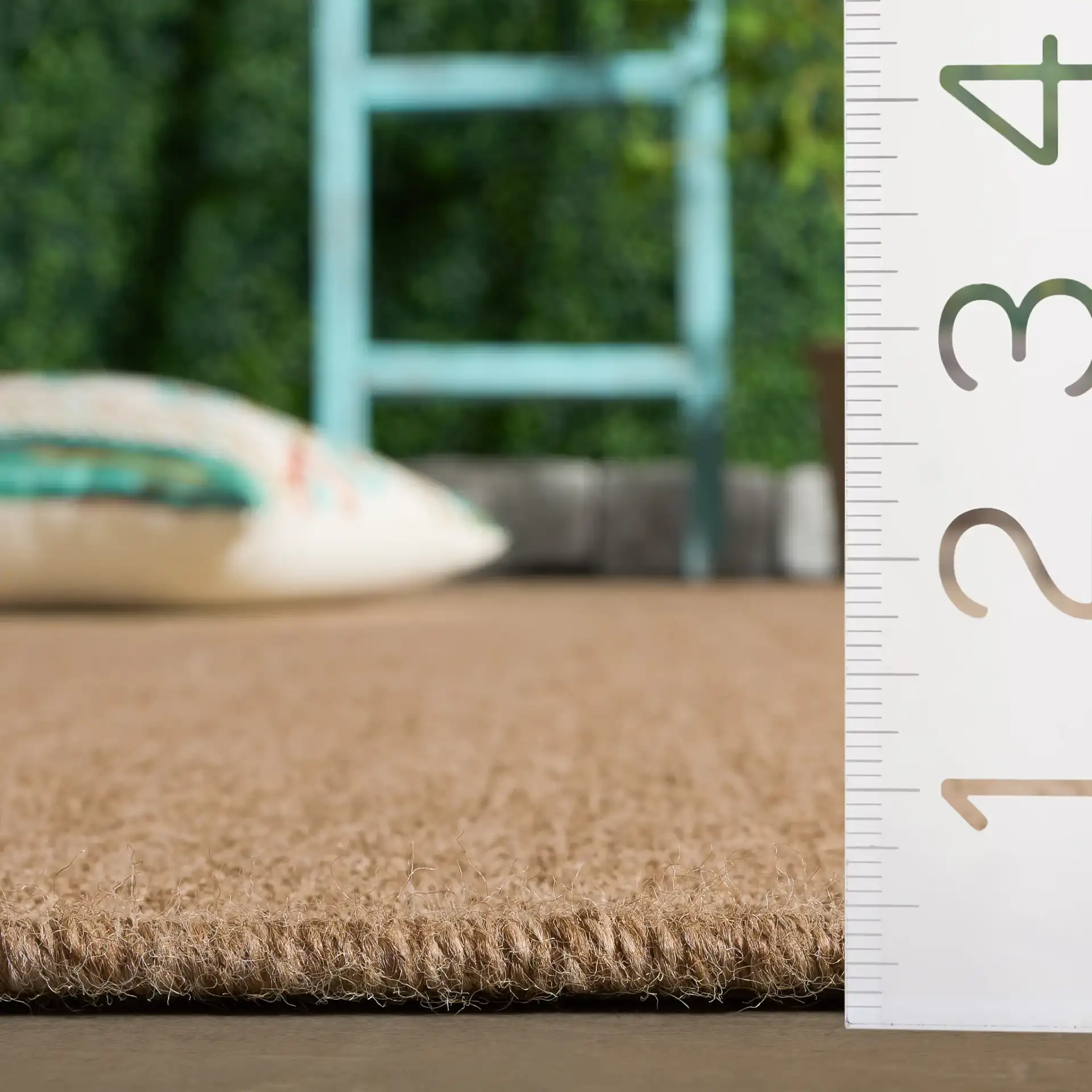 Sisal Performance Solid Rug in Natural in a styled room