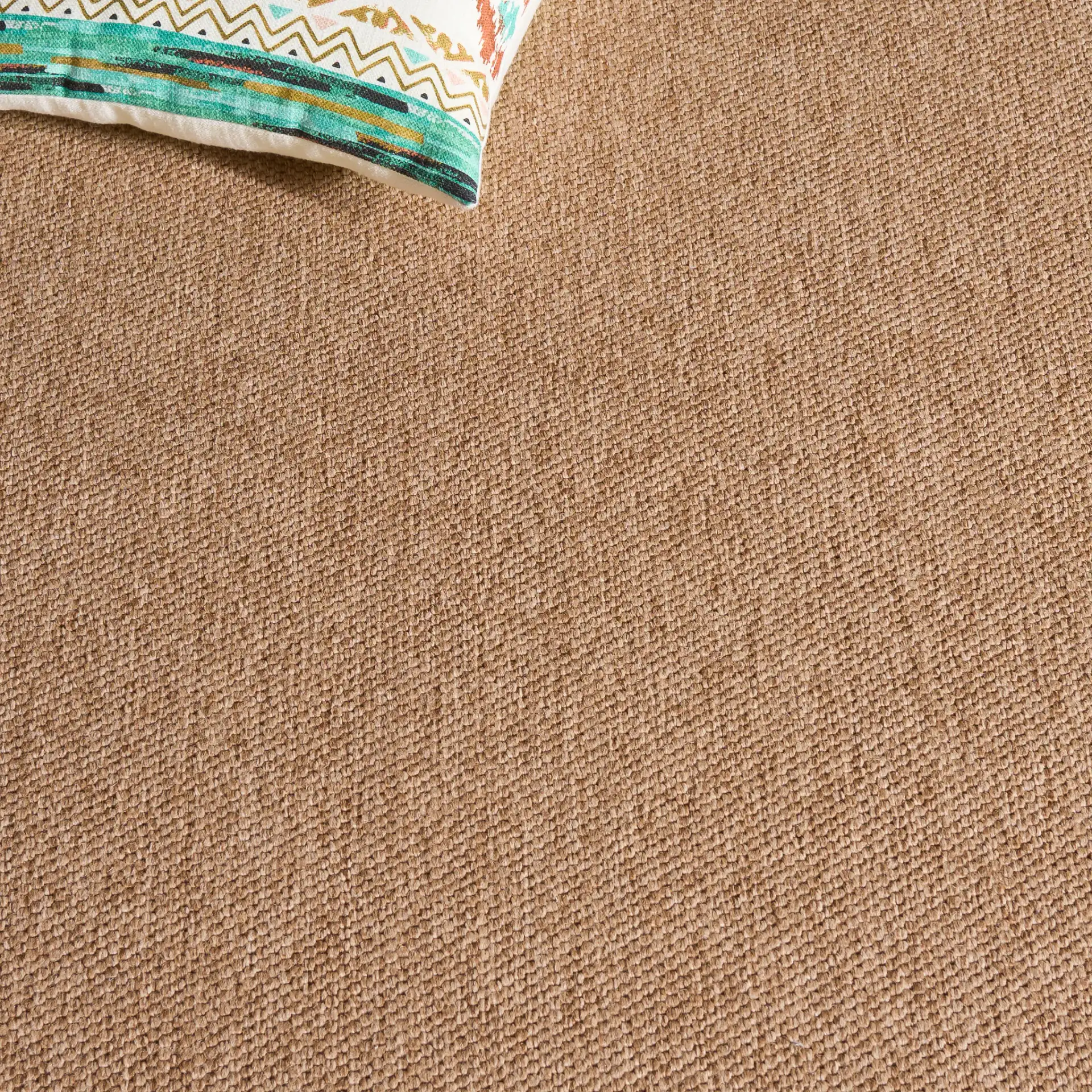 Sisal Performance Solid Rug in Natural in a styled room