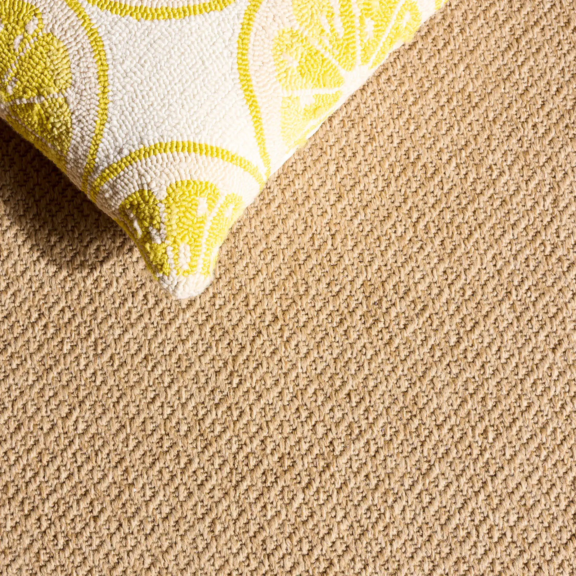 Sisal Performance Diamond Grid Rug in Natural in a styled room