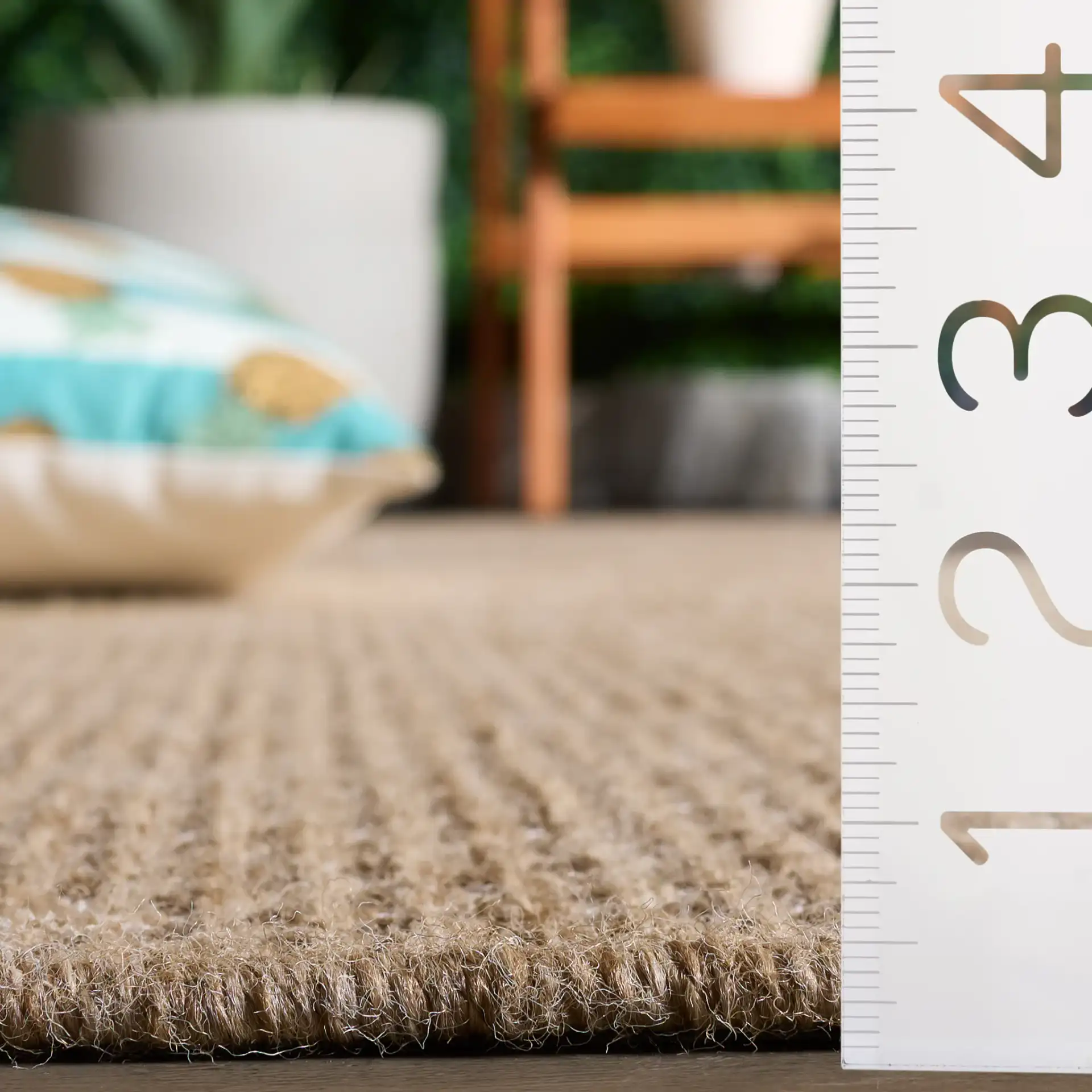 Sisal Performance Diamond Rug in Natural / Ivory in a styled room