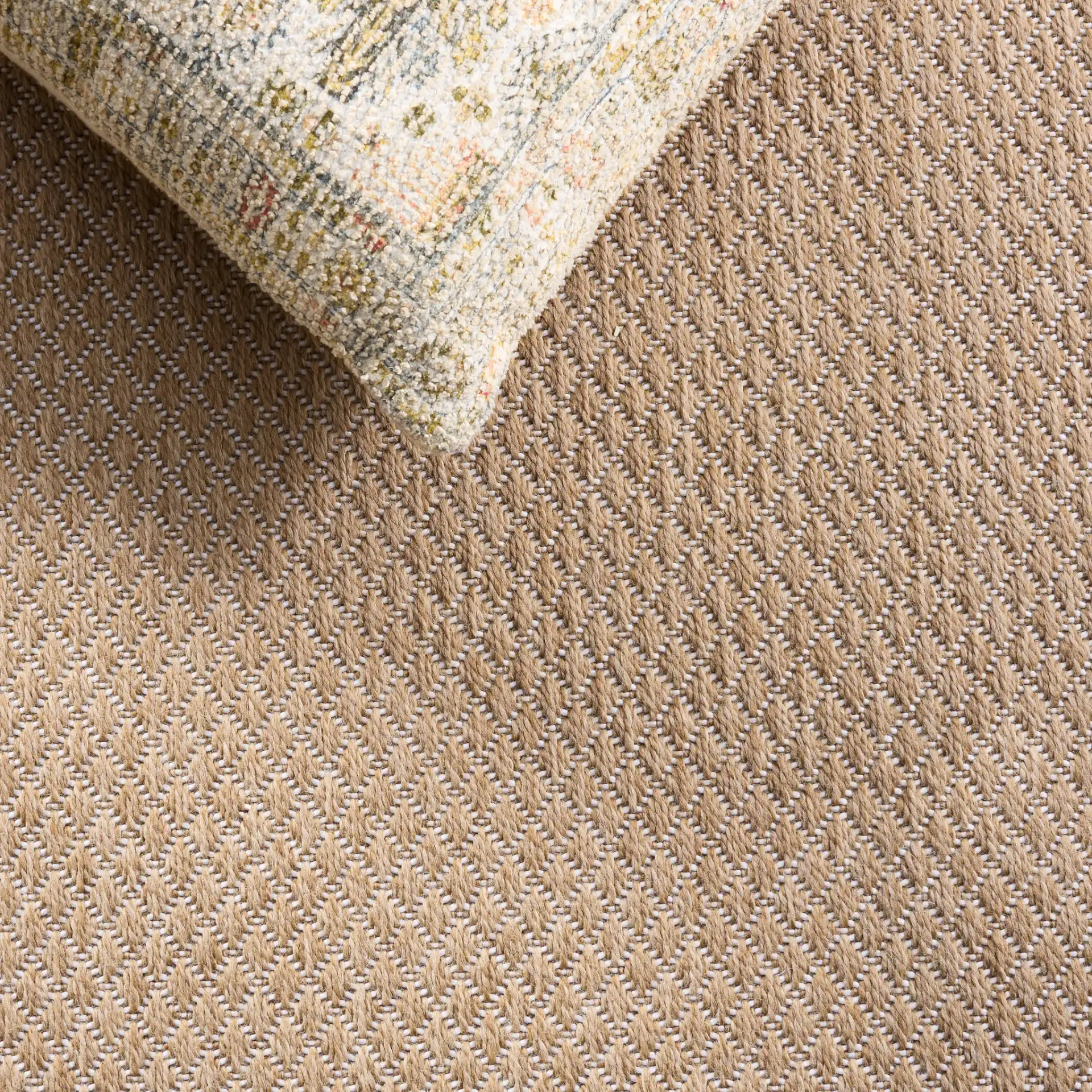 Sisal Performance Diamond Rug in Natural / Ivory in a styled room