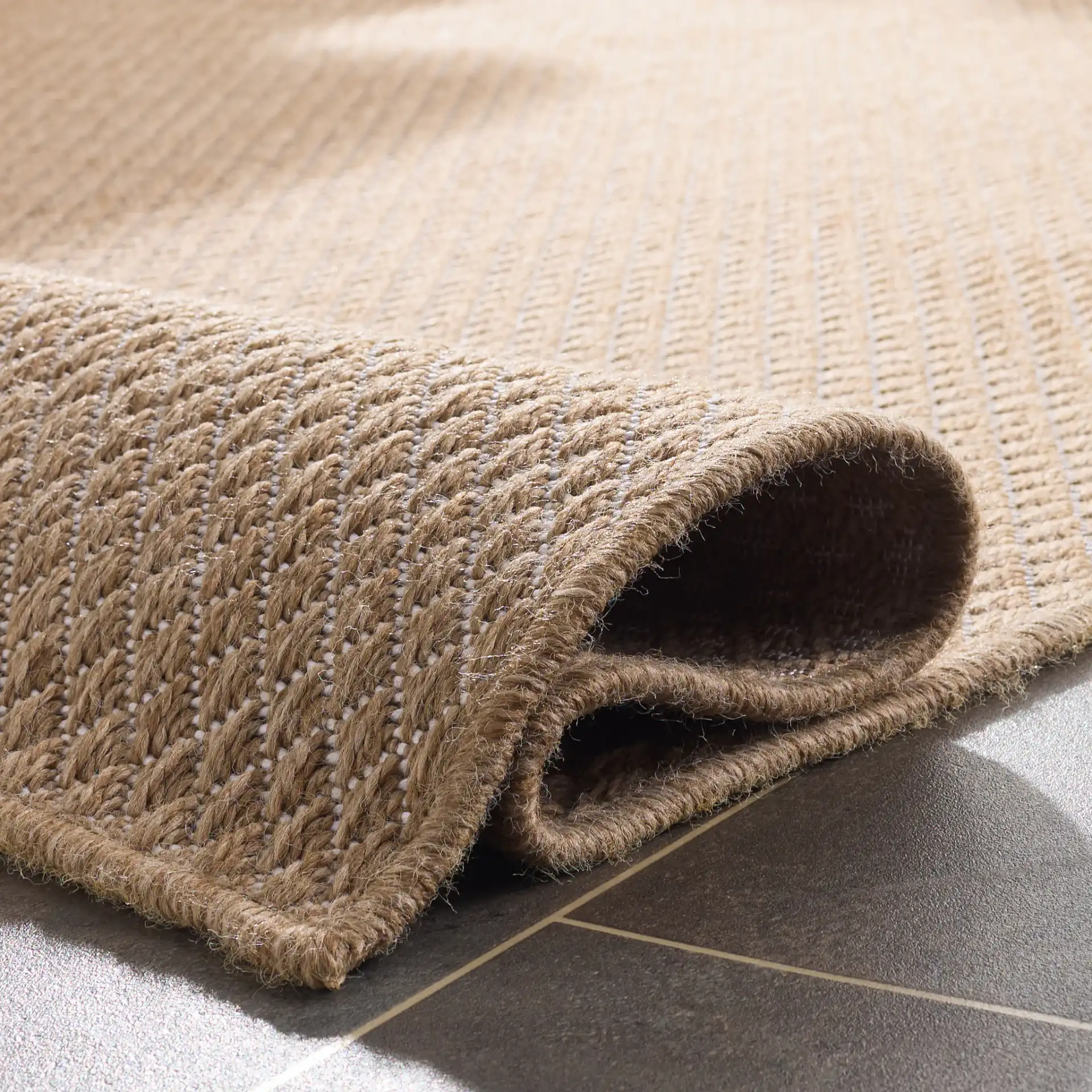 Sisal Performance Diamond Rug in Natural / Ivory in a styled room