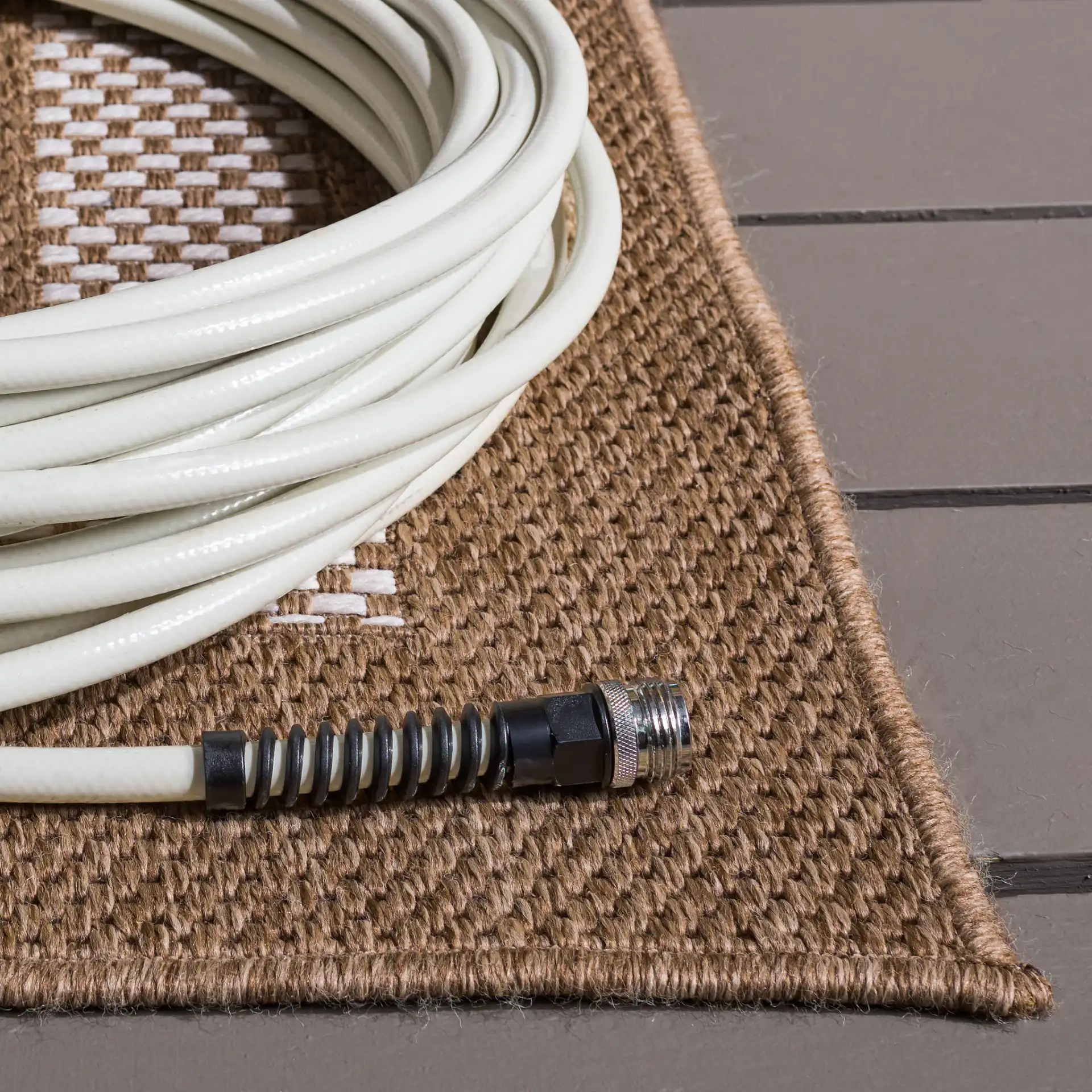 Sisal Performance Tulum Bordered Rug in Natural / Ivory in a styled room