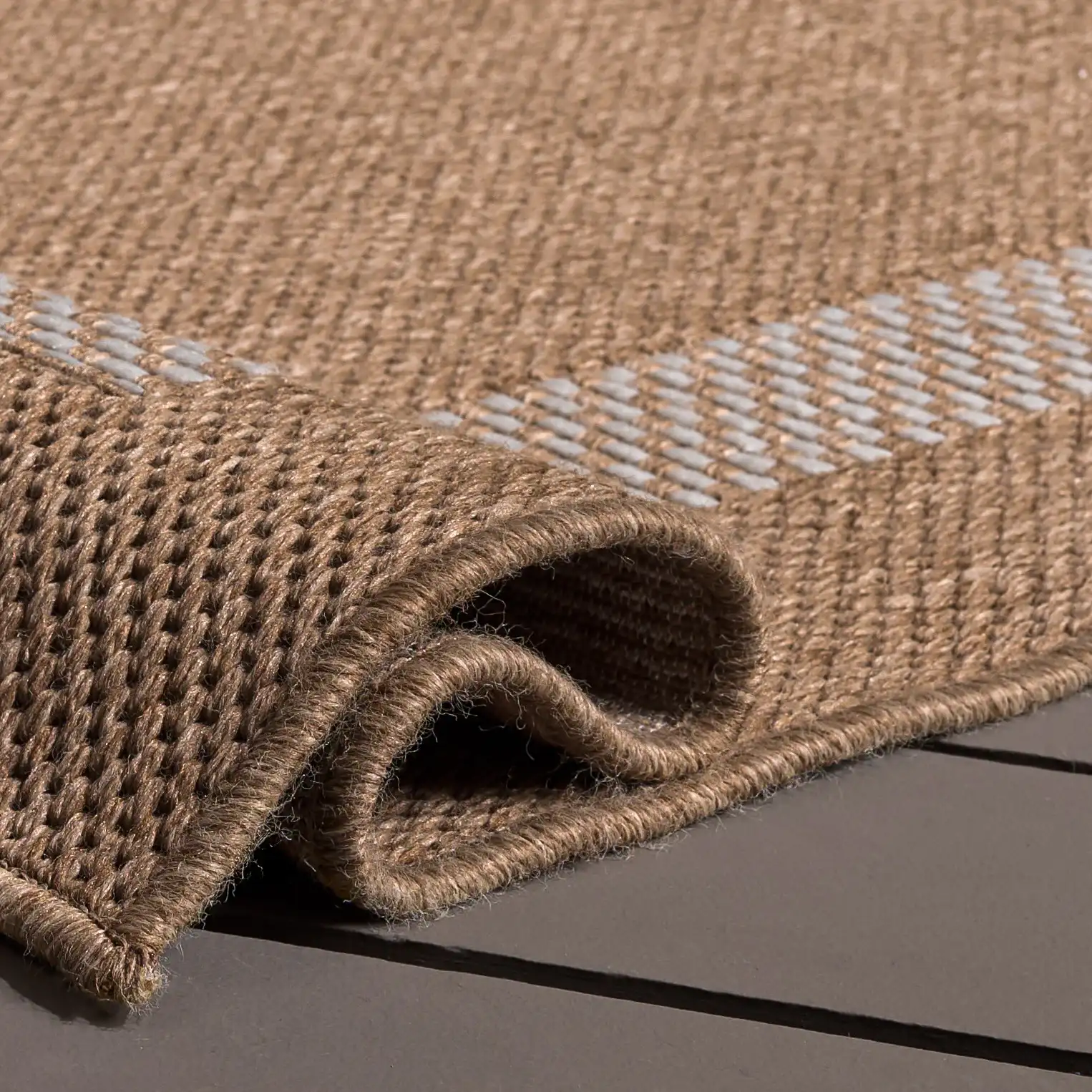 Sisal Performance Tulum Bordered Rug in Natural / Ivory in a styled room
