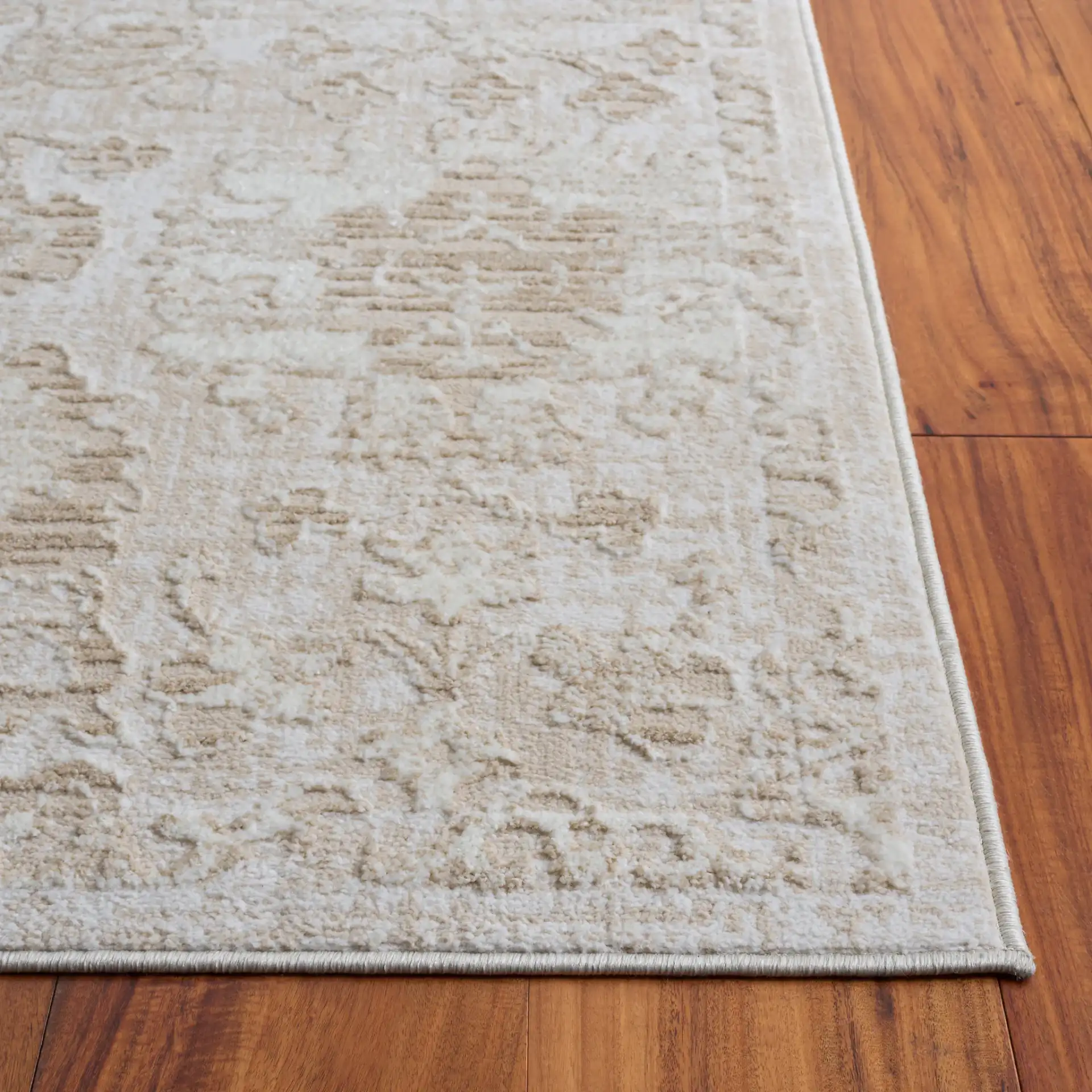 Spencer Transitional Allover Rug in Beige / Ivory in a styled room