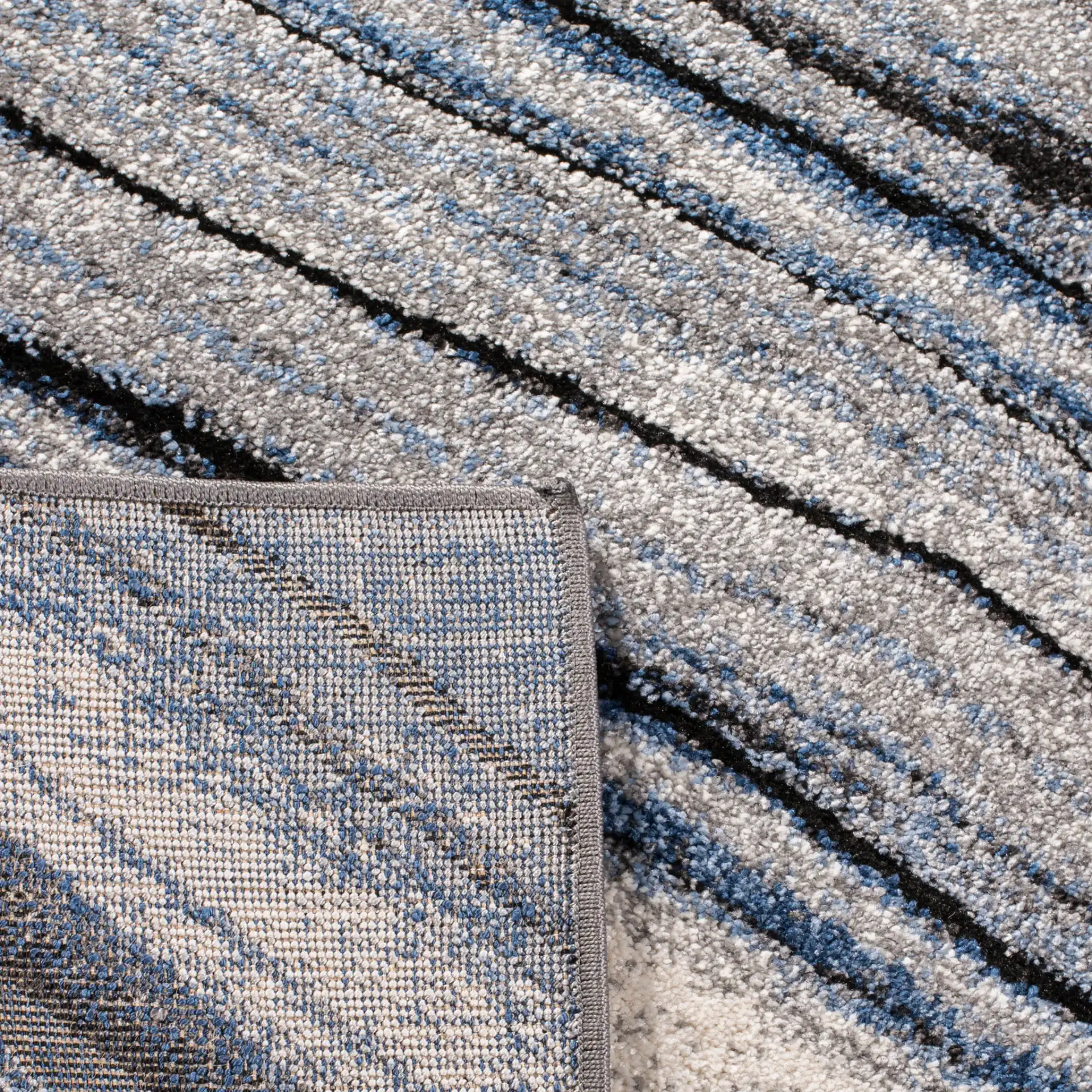 Spirit Marble Swirl Rug in Blue / Gray in a styled room