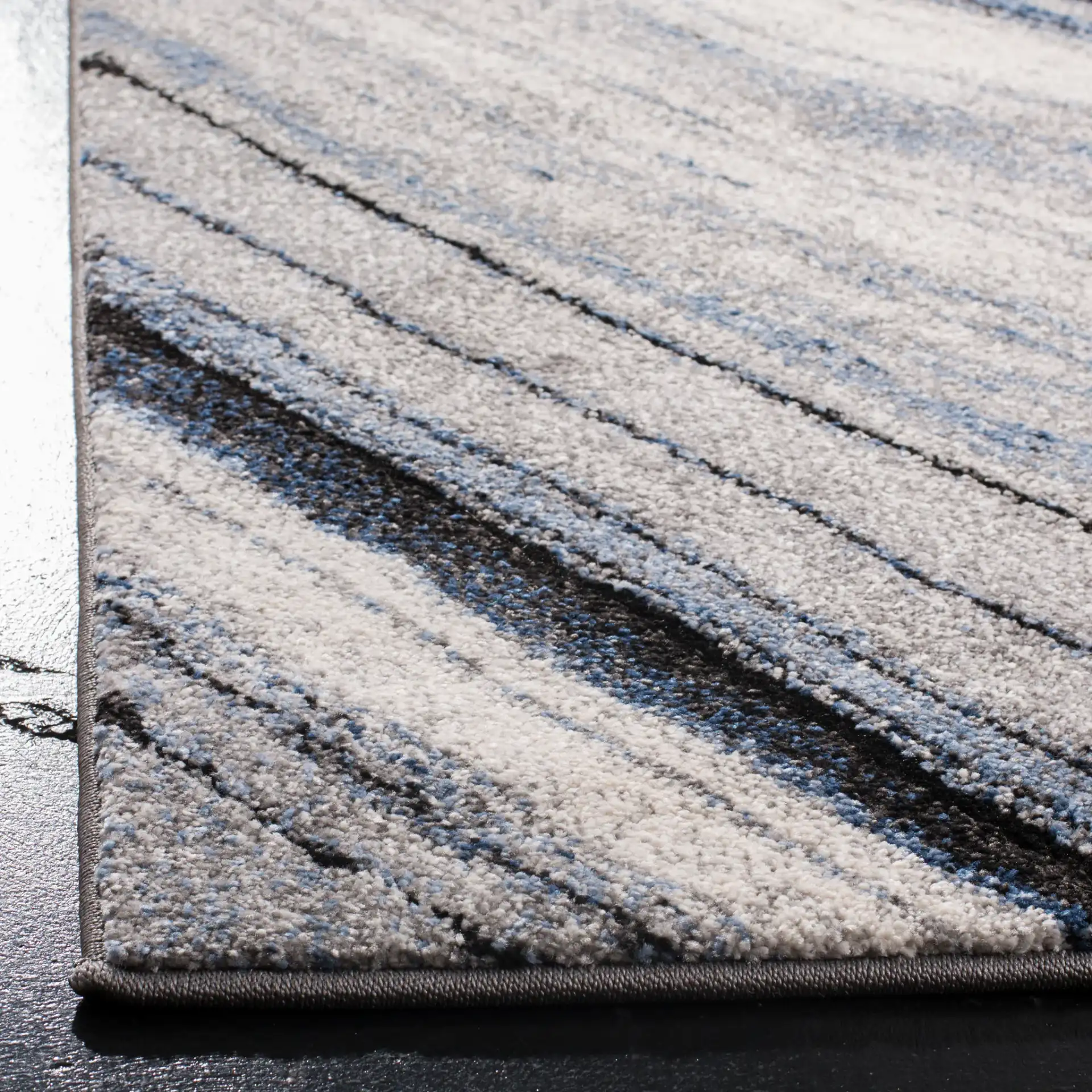 Spirit Marble Swirl Rug in Blue / Gray in a styled room