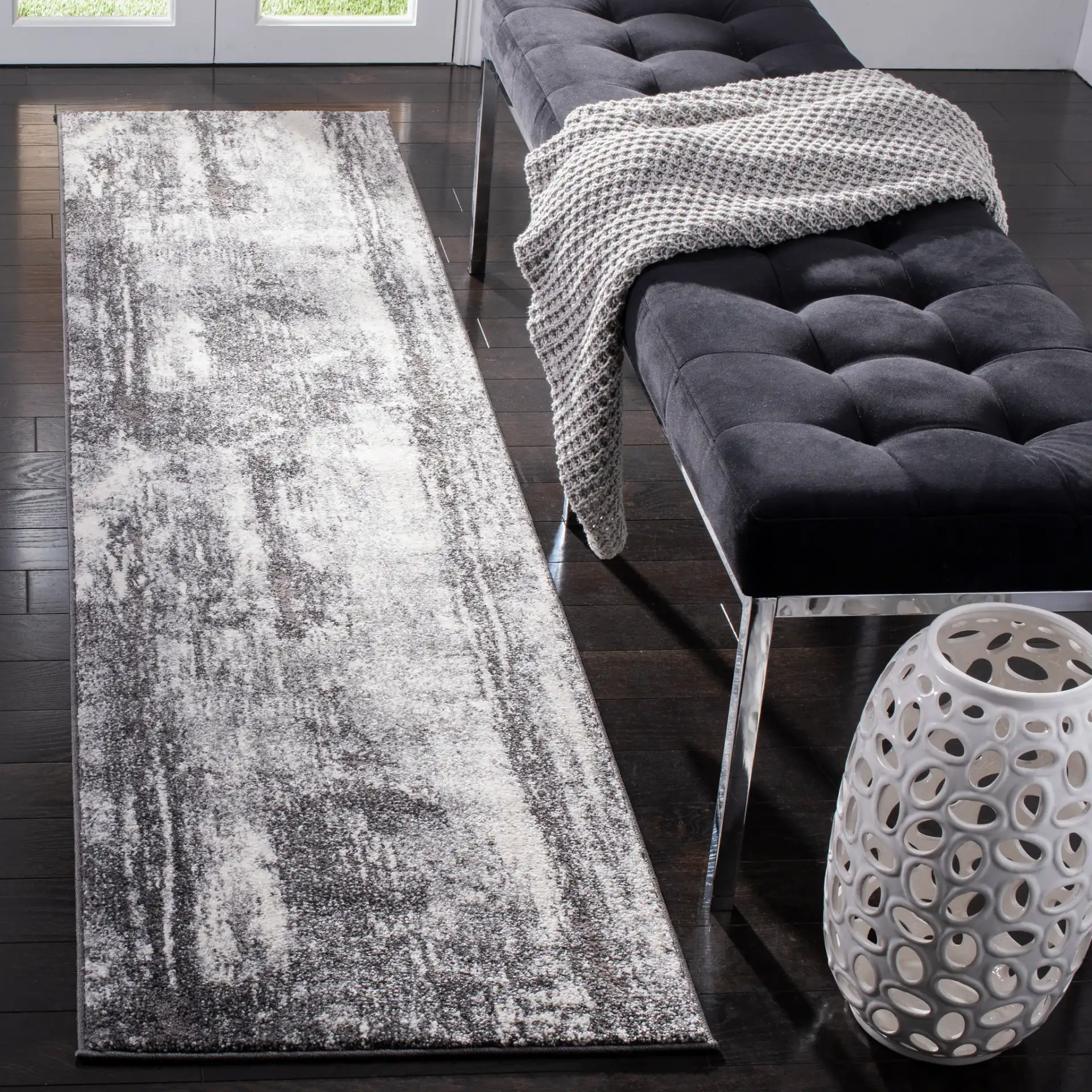 Spirit Modern Abstract Rug in Dark Gray / Ivory in a styled room