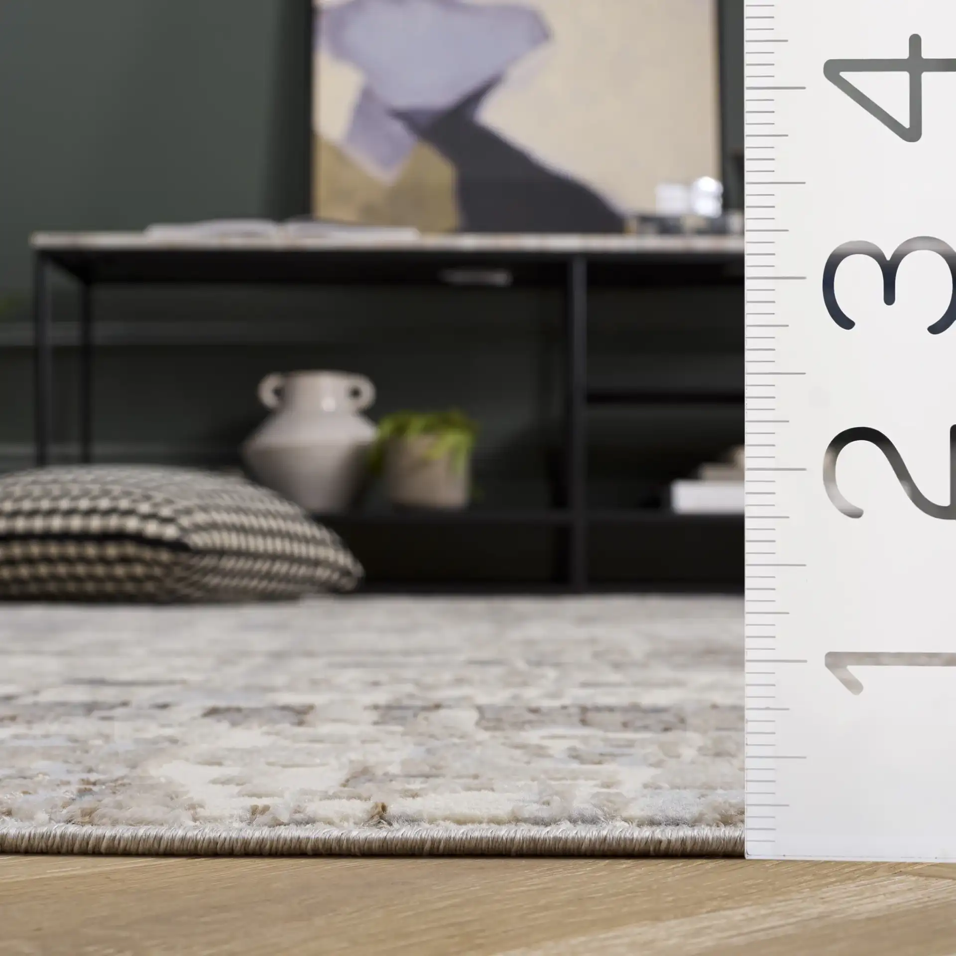 Spectrum Modern Abstract Rug in Ivory / Gray in a styled room