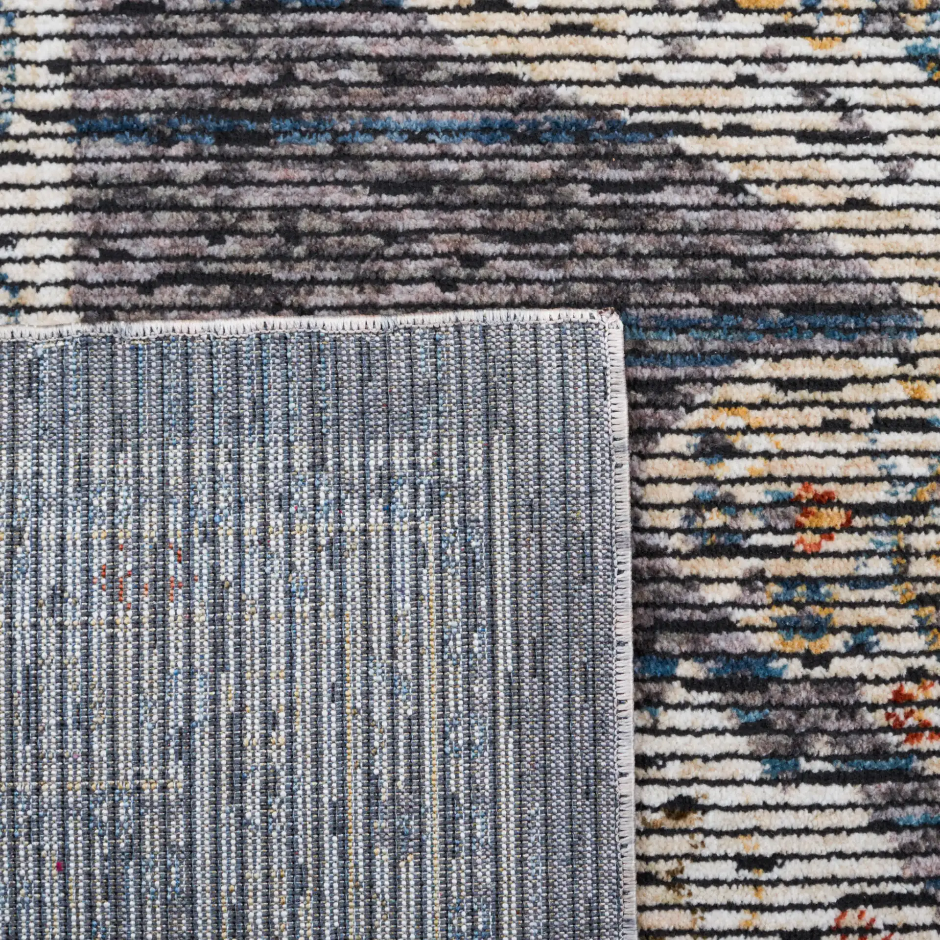 Sierra Medallion Bordered Rug in Ivory / Gray in a styled room