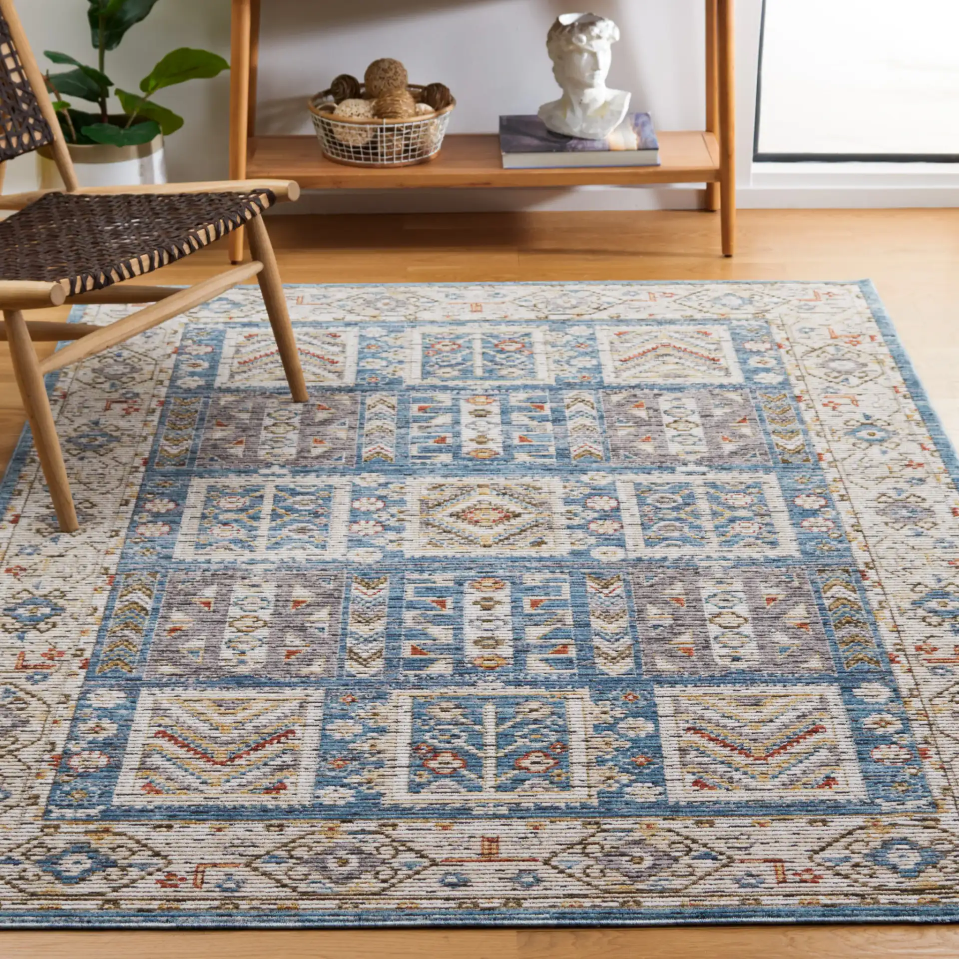 Sierra Geometric Panel Rug in Ivory / Blue in a styled room