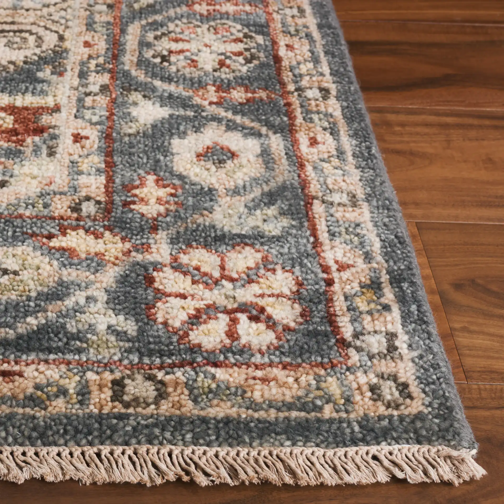 Samarkand Stepped Medallion Hand-Knotted Wool Rug in Blue / Ivory in a styled room