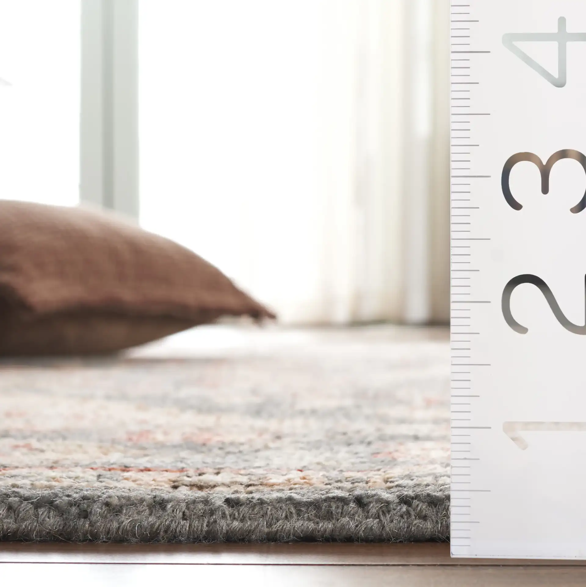 Samarkand Stepped Medallion Hand-Knotted Wool Rug in Blue / Ivory in a styled room