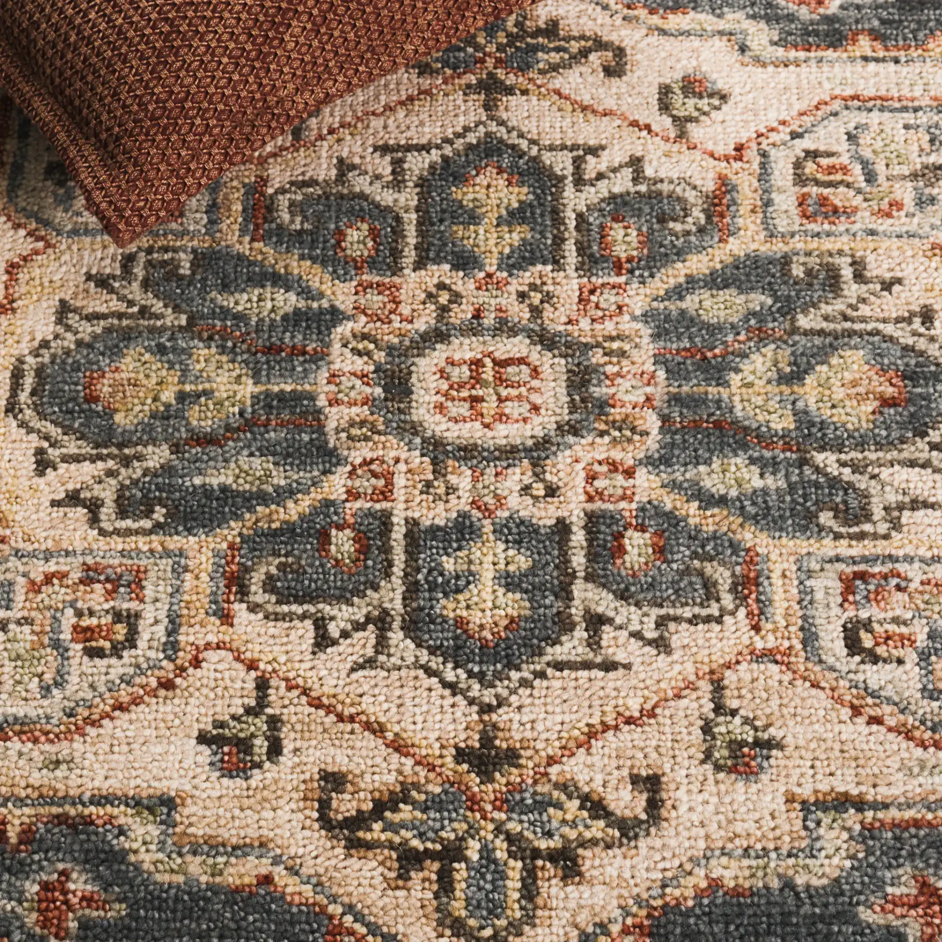 Samarkand Stepped Medallion Hand-Knotted Wool Rug in Blue / Ivory in a styled room