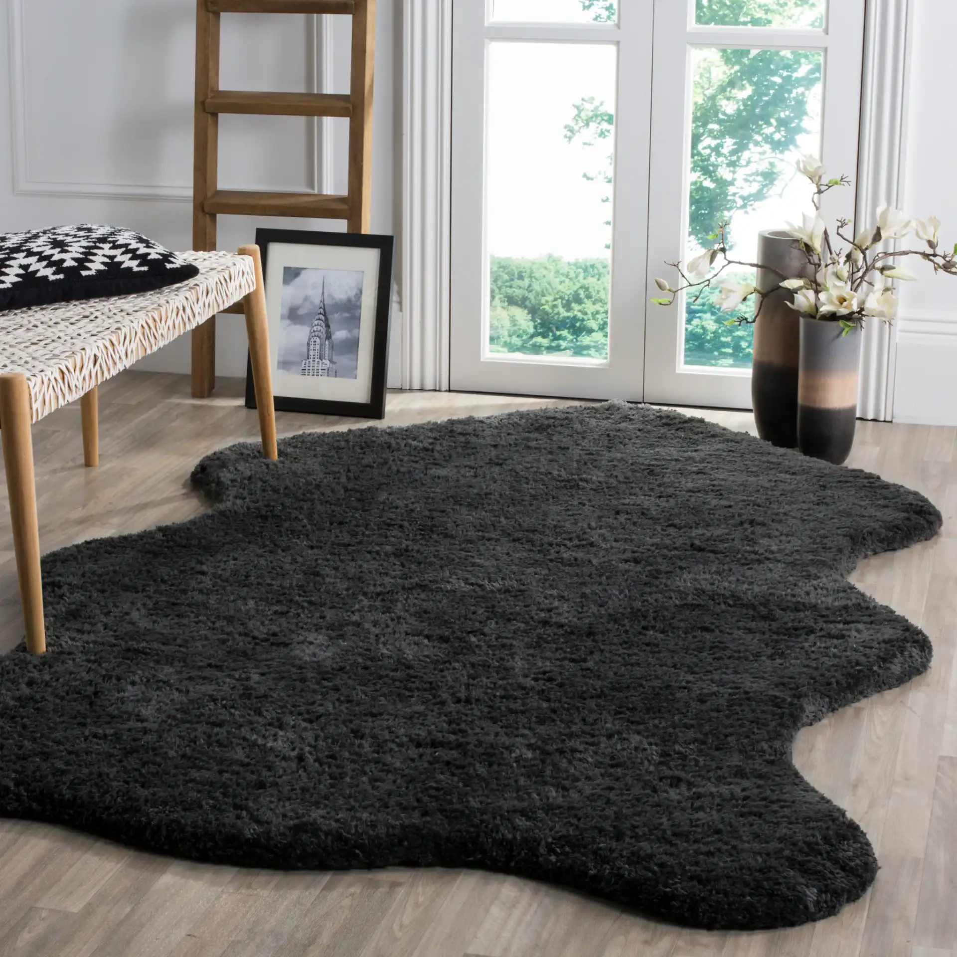 Sheep Hand-Woven Pelt Shag Rug in Charcoal in a styled room