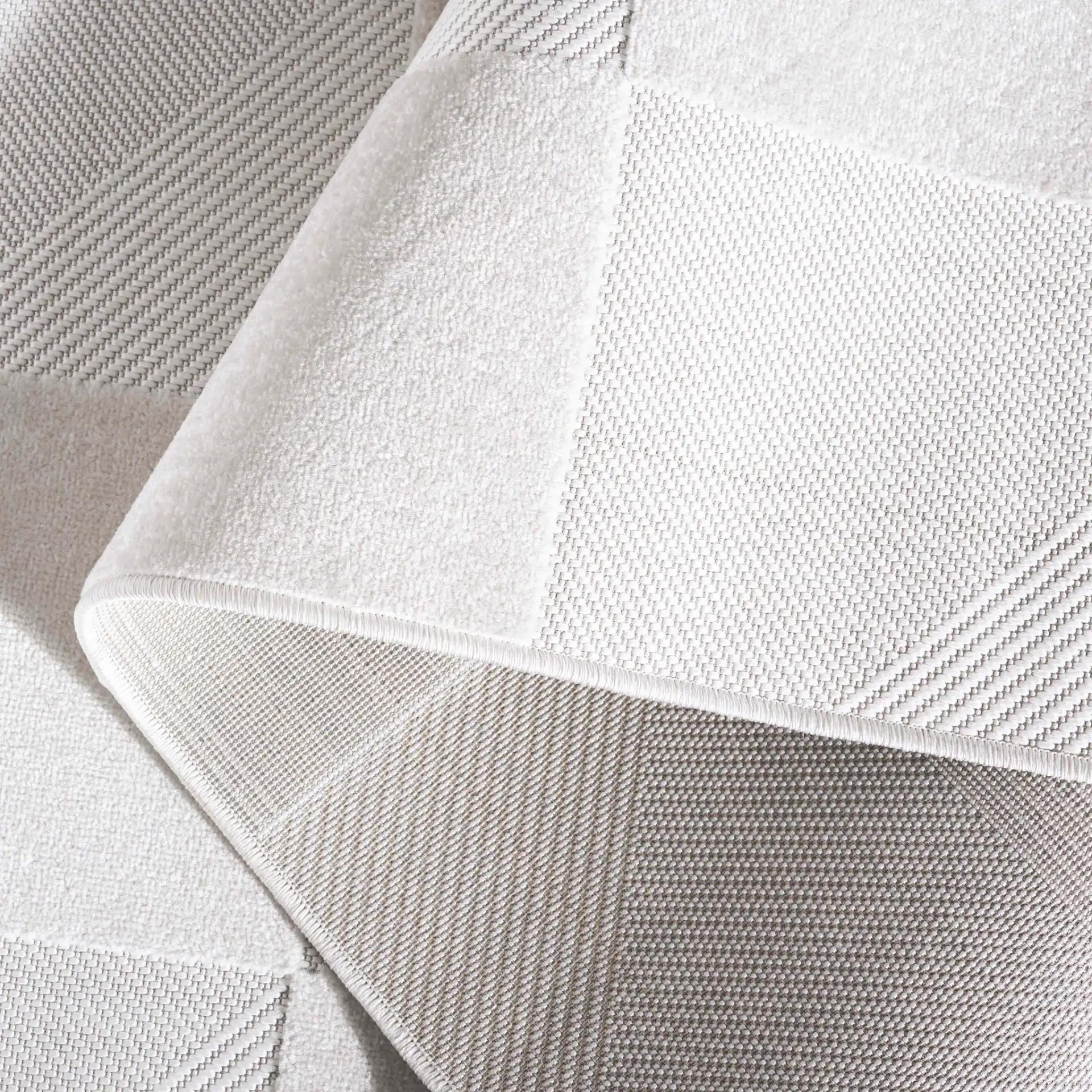 Stella Geometric Block Outdoor Rug in Ivory in a styled room