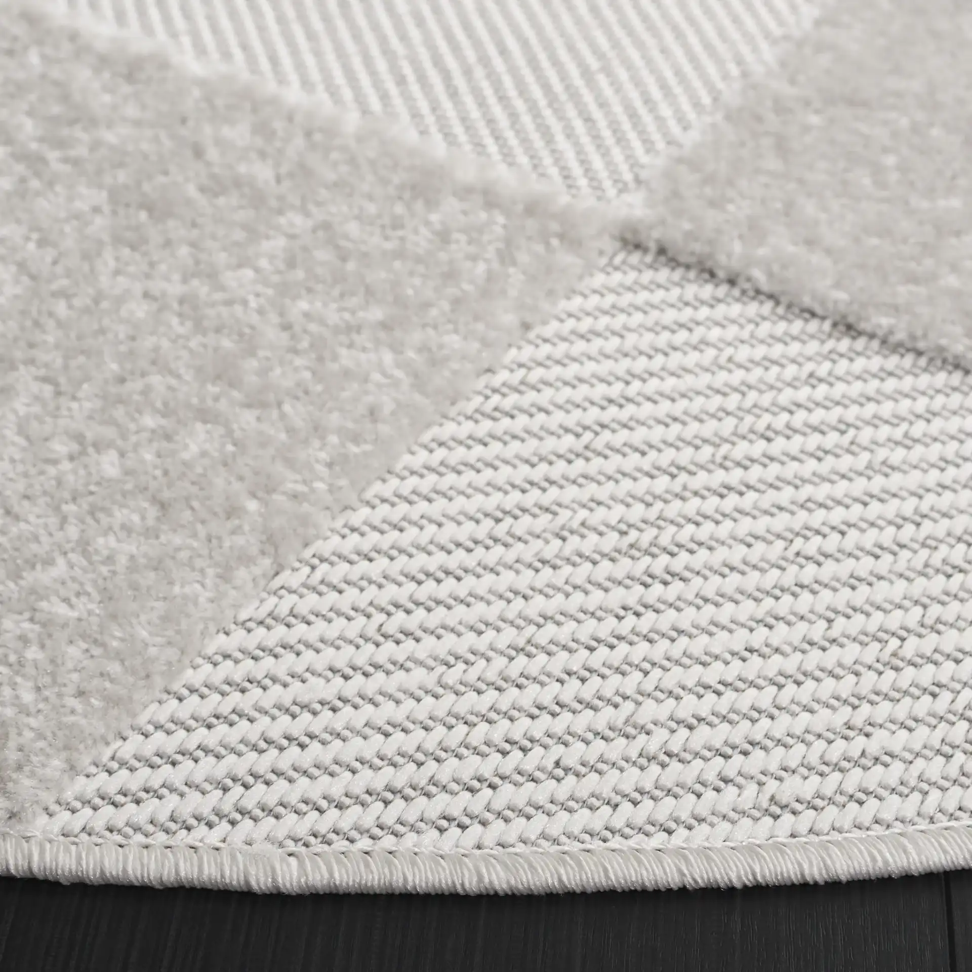 Stella Geometric Block Outdoor Rug in Ivory in a styled room