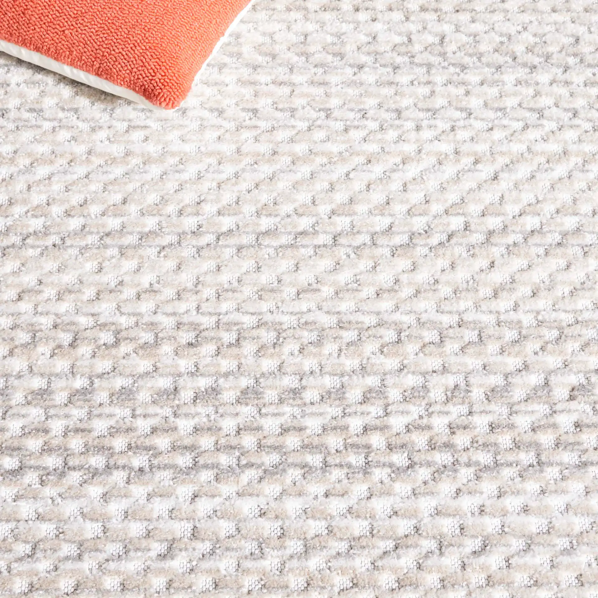 Stella Dotted Stripe Outdoor Rug in Beige / Gray in a styled room