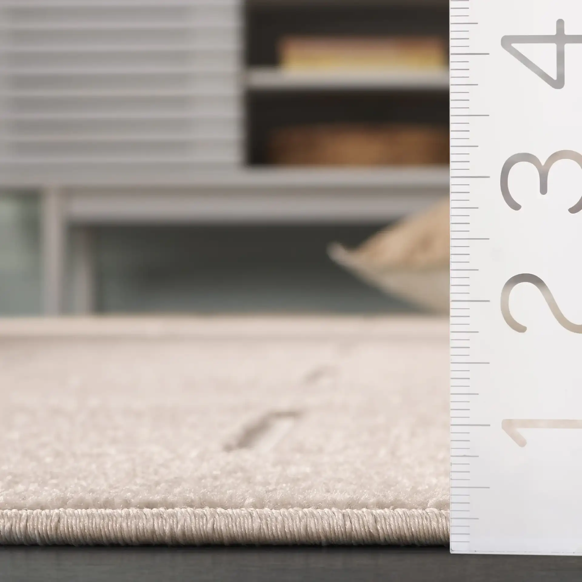 Stella Geometric Lattice Outdoor Rug in Beige in a styled room