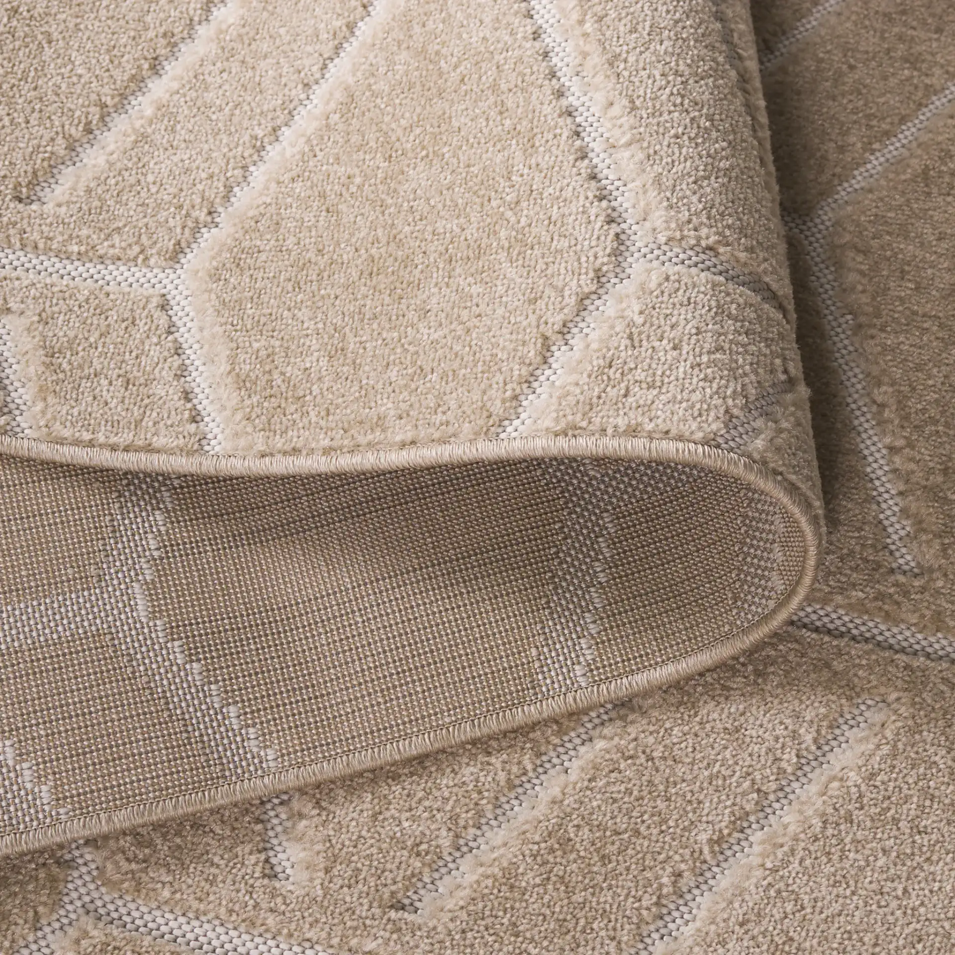 Stella Geometric Lattice Outdoor Rug in Beige in a styled room