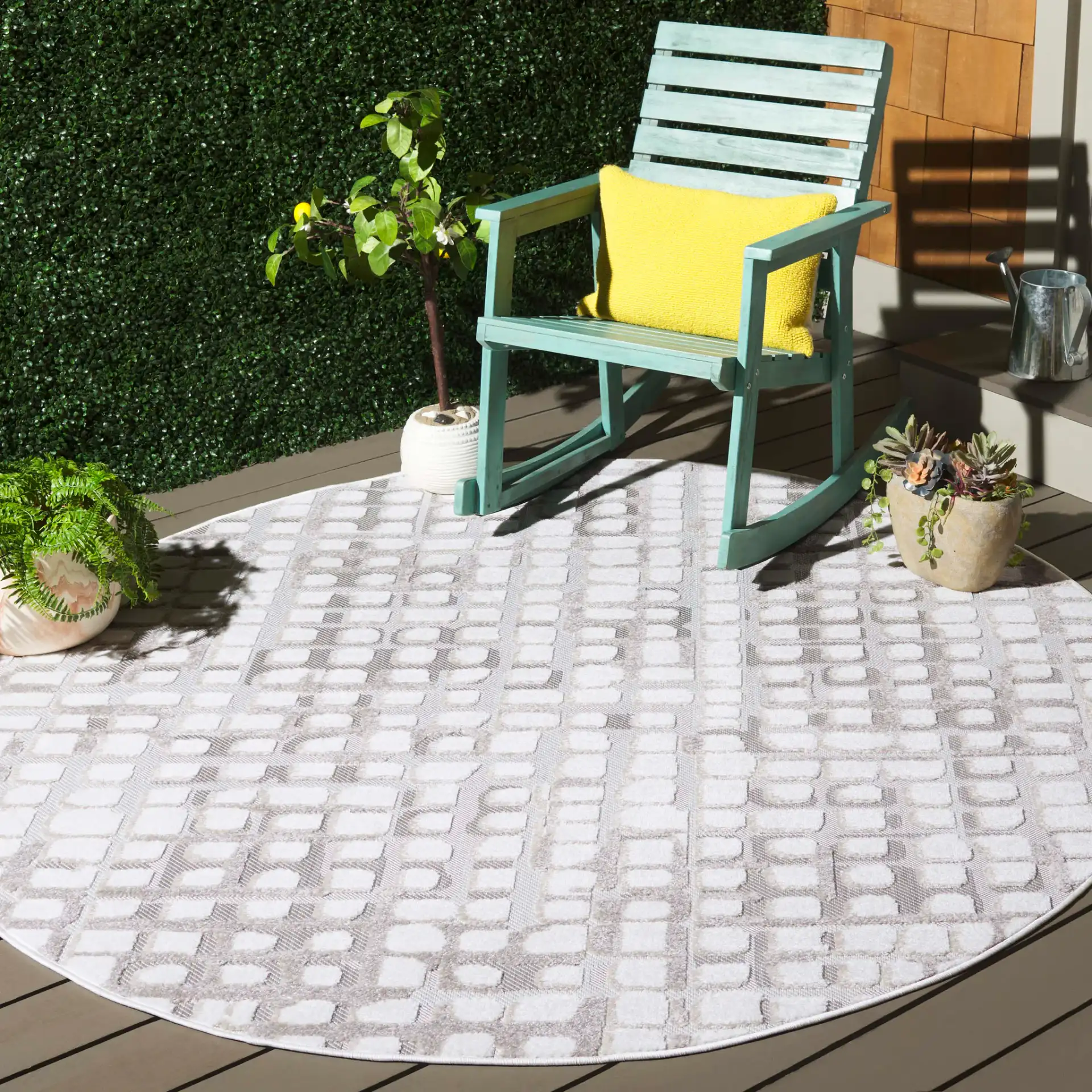 Stella Grid Outdoor Rug in Ivory / Beige in a styled room