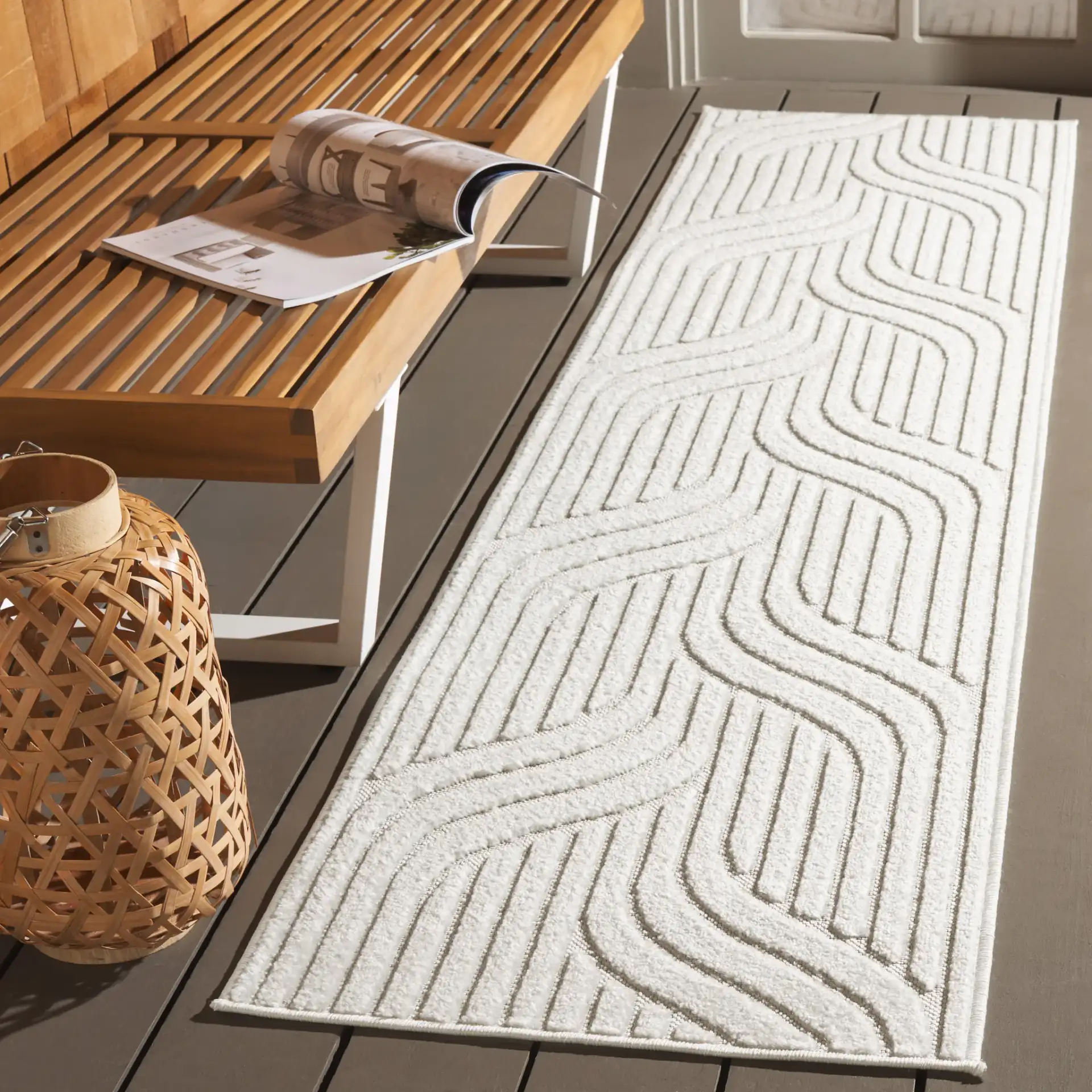 Stella Wave Outdoor Rug in Ivory in a styled room