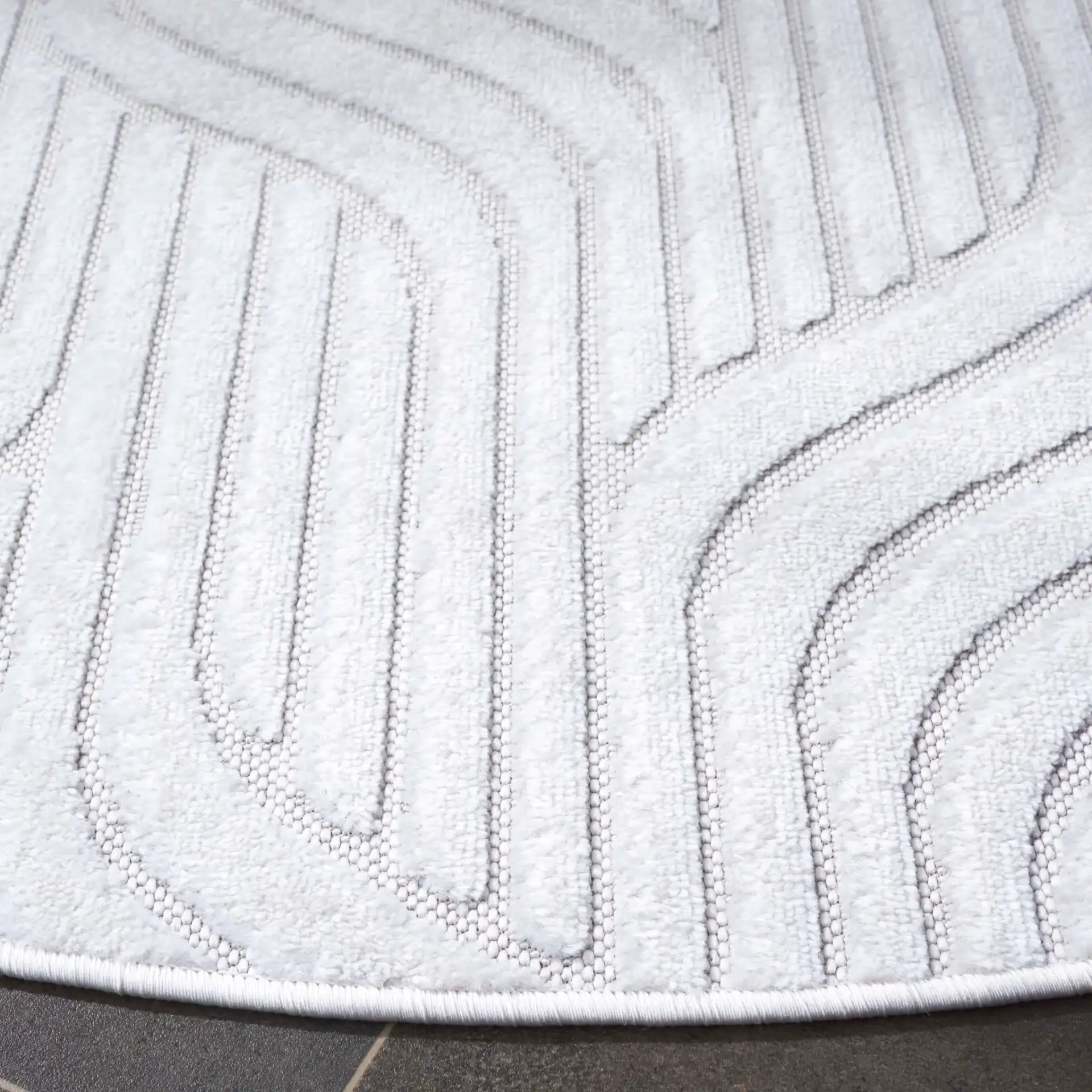 Stella Wave Outdoor Rug in Ivory in a styled room