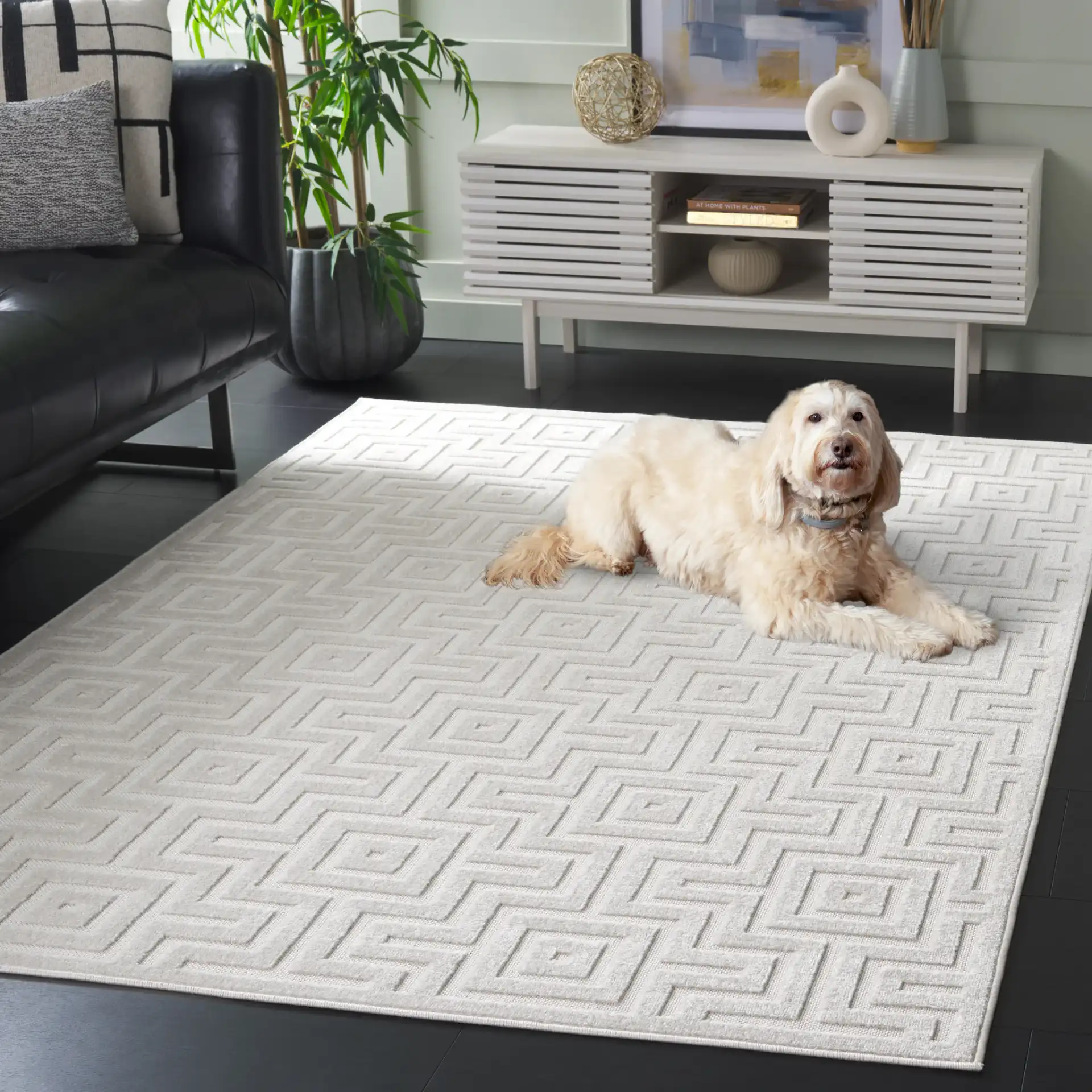 Stella Interlocking Squares Outdoor Rug in Ivory in a styled room