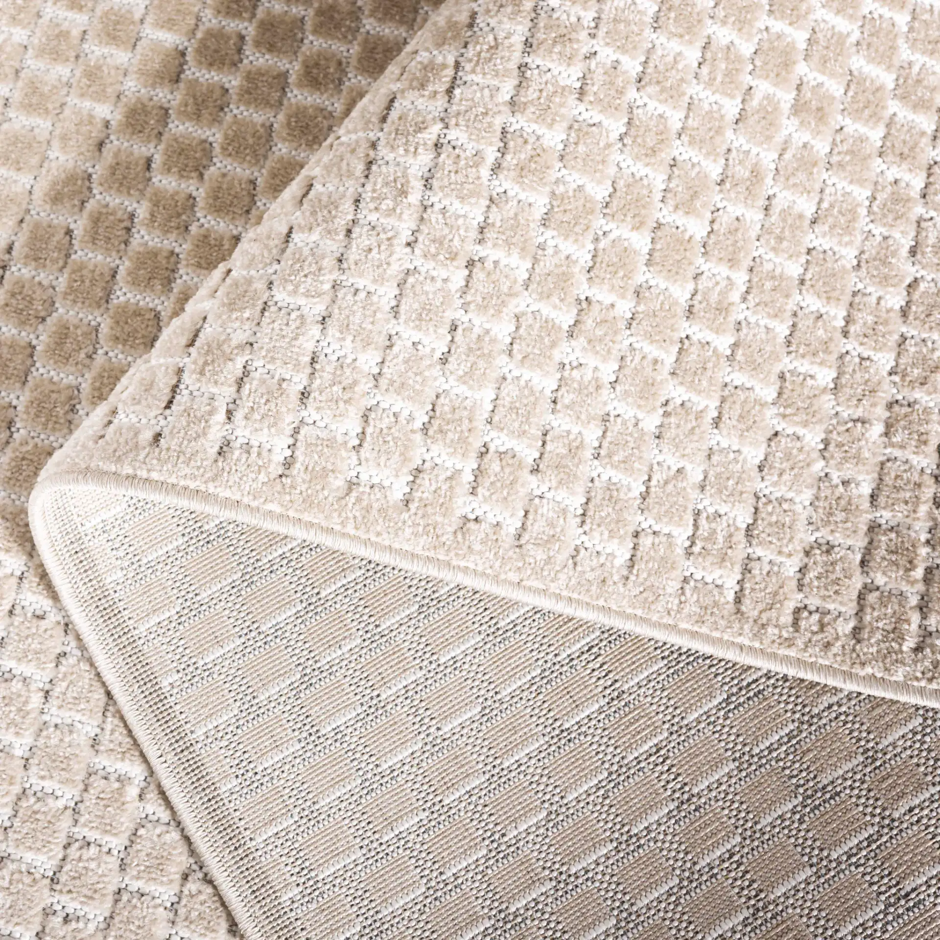 Stella Basketweave Outdoor Rug in Beige in a styled room