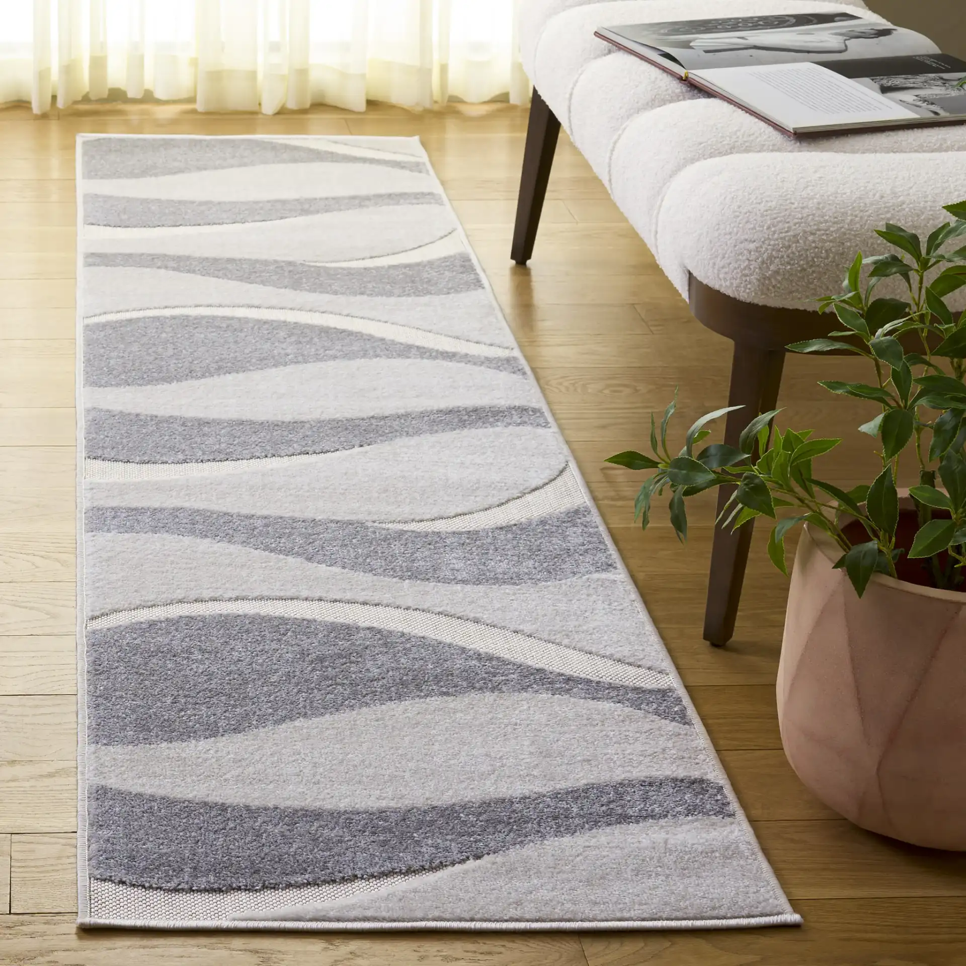 Stella Modern Wave Rug in Ivory / Gray in a styled room