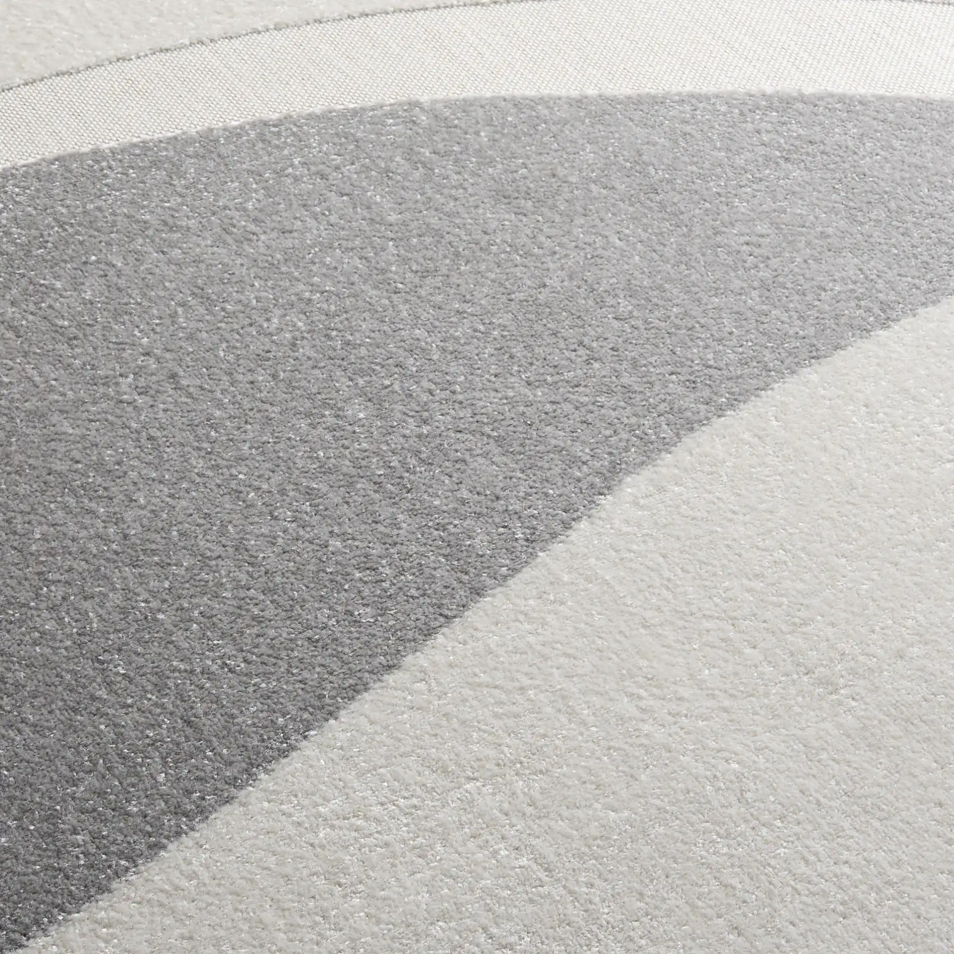 Stella Modern Wave Rug in Ivory / Gray in a styled room