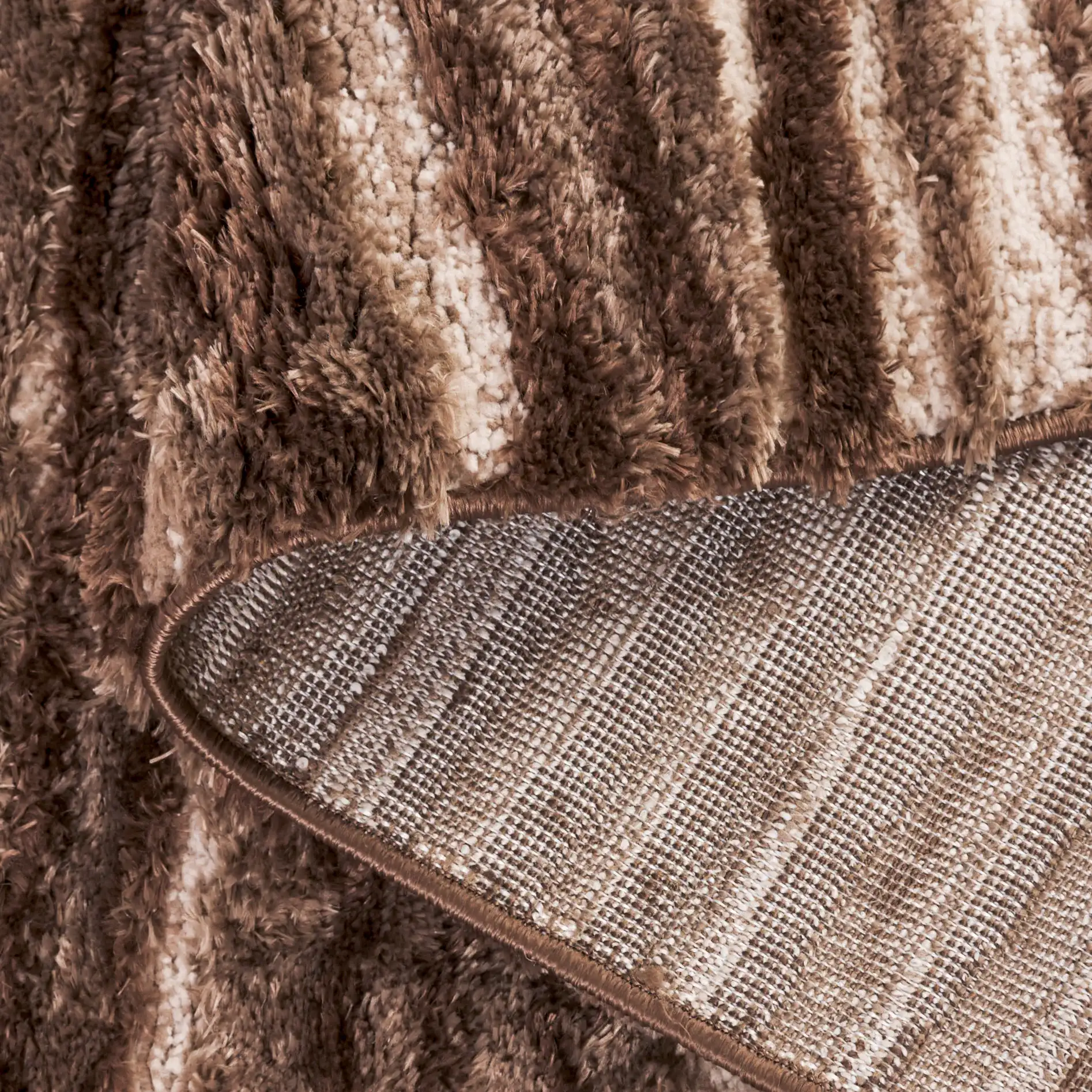 Seattle Ribbed Stripe Shag Rug in Brown / Ivory in a styled room
