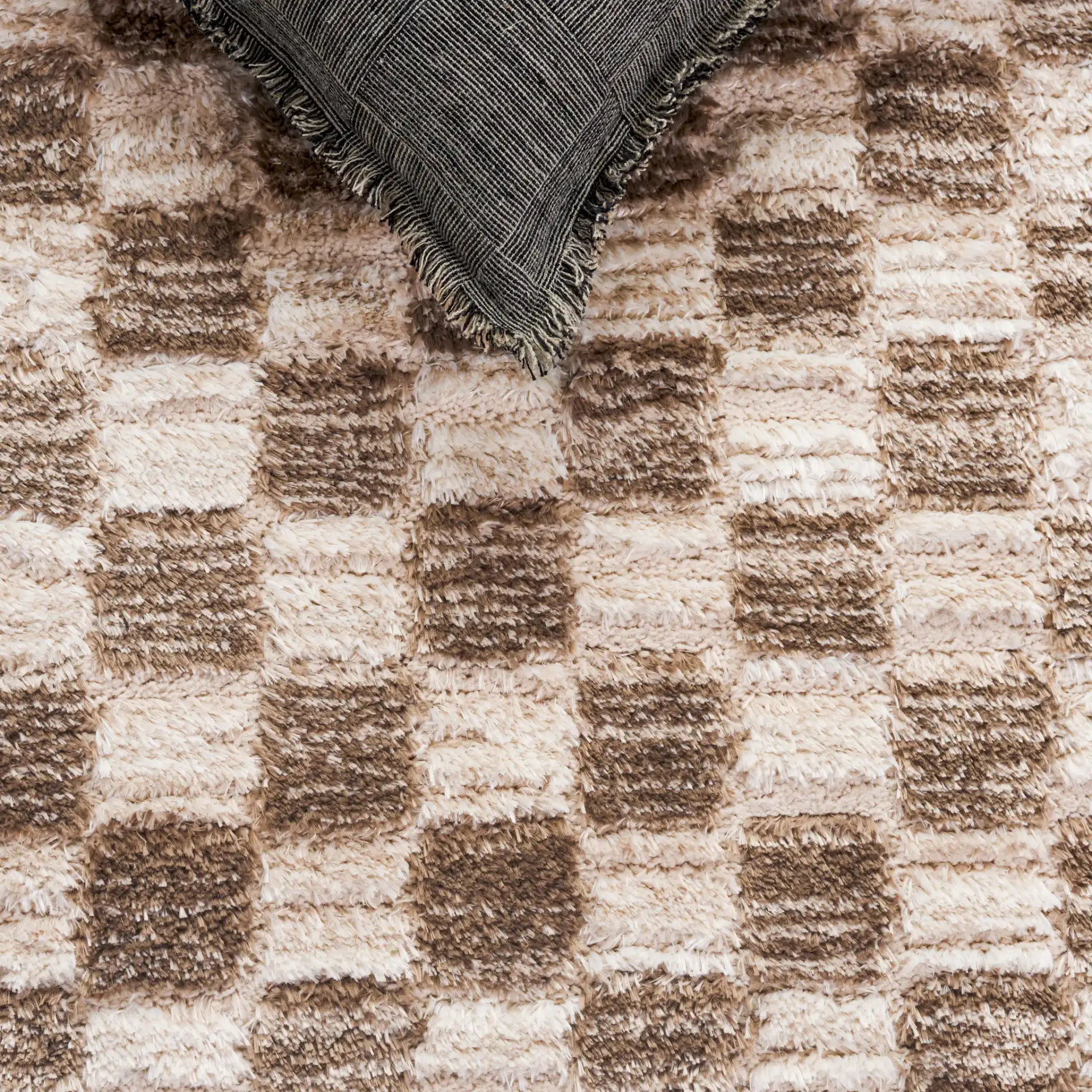 Seattle Checkered Shag Rug in Ivory / Brown in a styled room