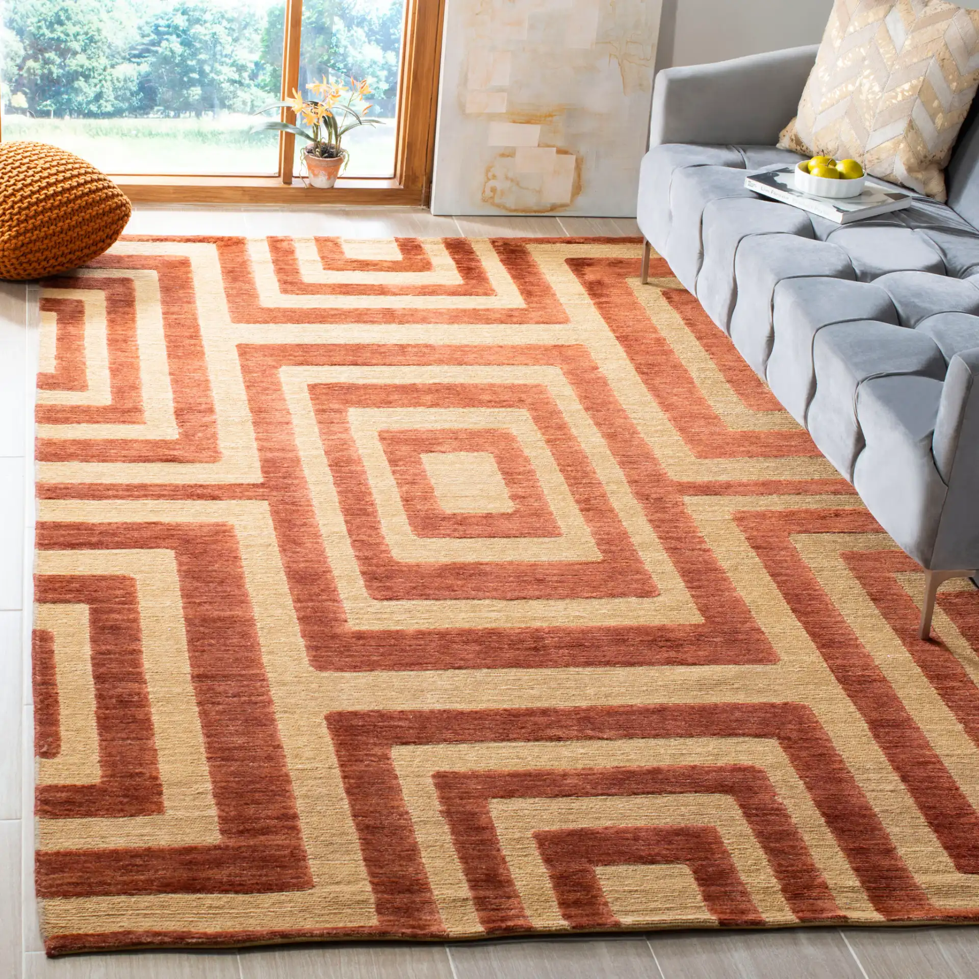 Santa Fe Interlocking Square Hand-Knotted Wool Rug in Light Gold in a styled room
