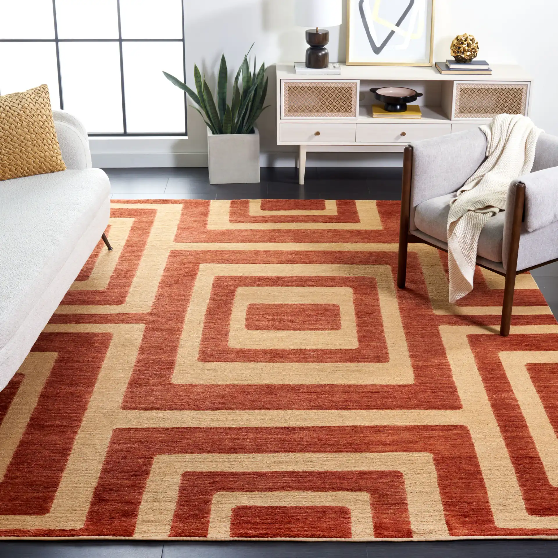 Santa Fe Interlocking Square Hand-Knotted Wool Rug in Light Gold in a styled room