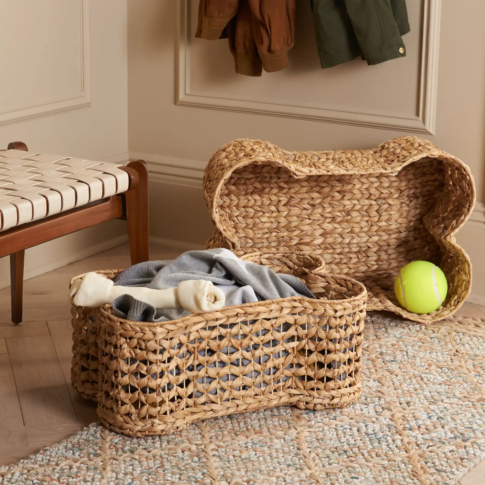 Roscoe Dog Bone Baskets (Set Of 2) in Natural in a styled room
