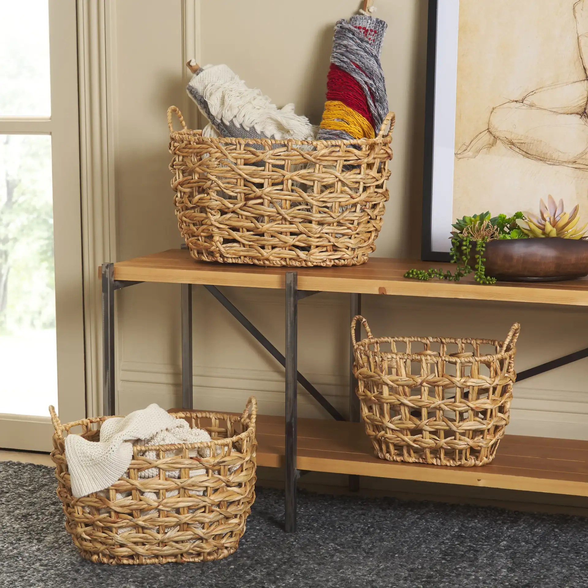 Langdon Set Of Three Baskets in Natural in a styled room