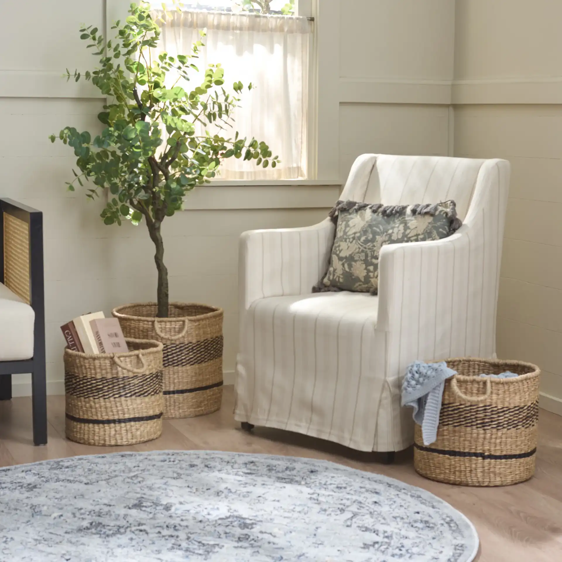 Beris Set Of Three-Baskets in Natural / Black in a styled room