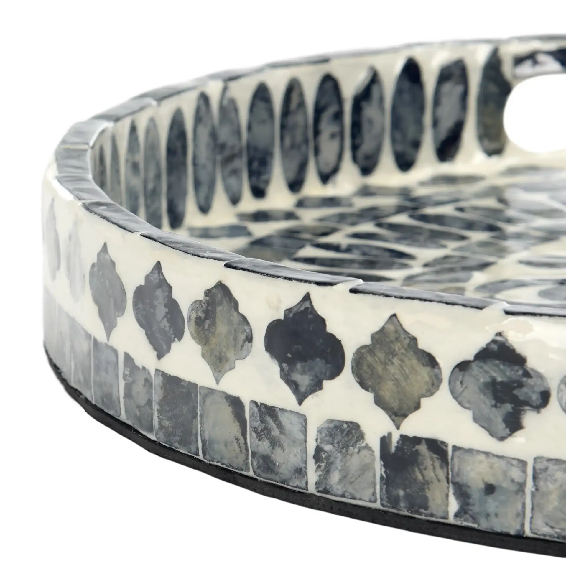 Yaneth Round Tray in Grey / White in a styled room