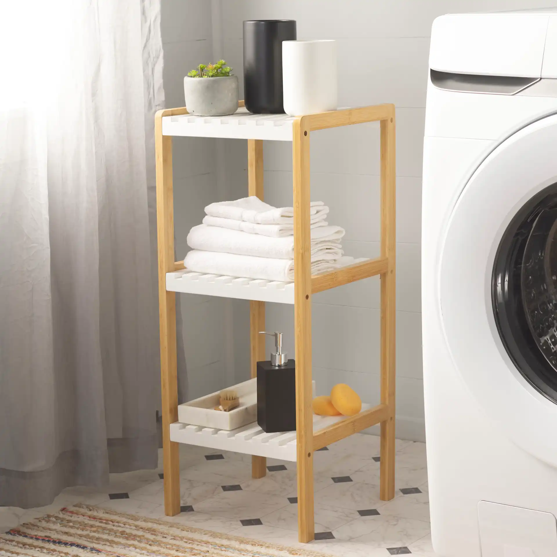 Paxter Three-Tier Shelf in White / Natural in a styled room