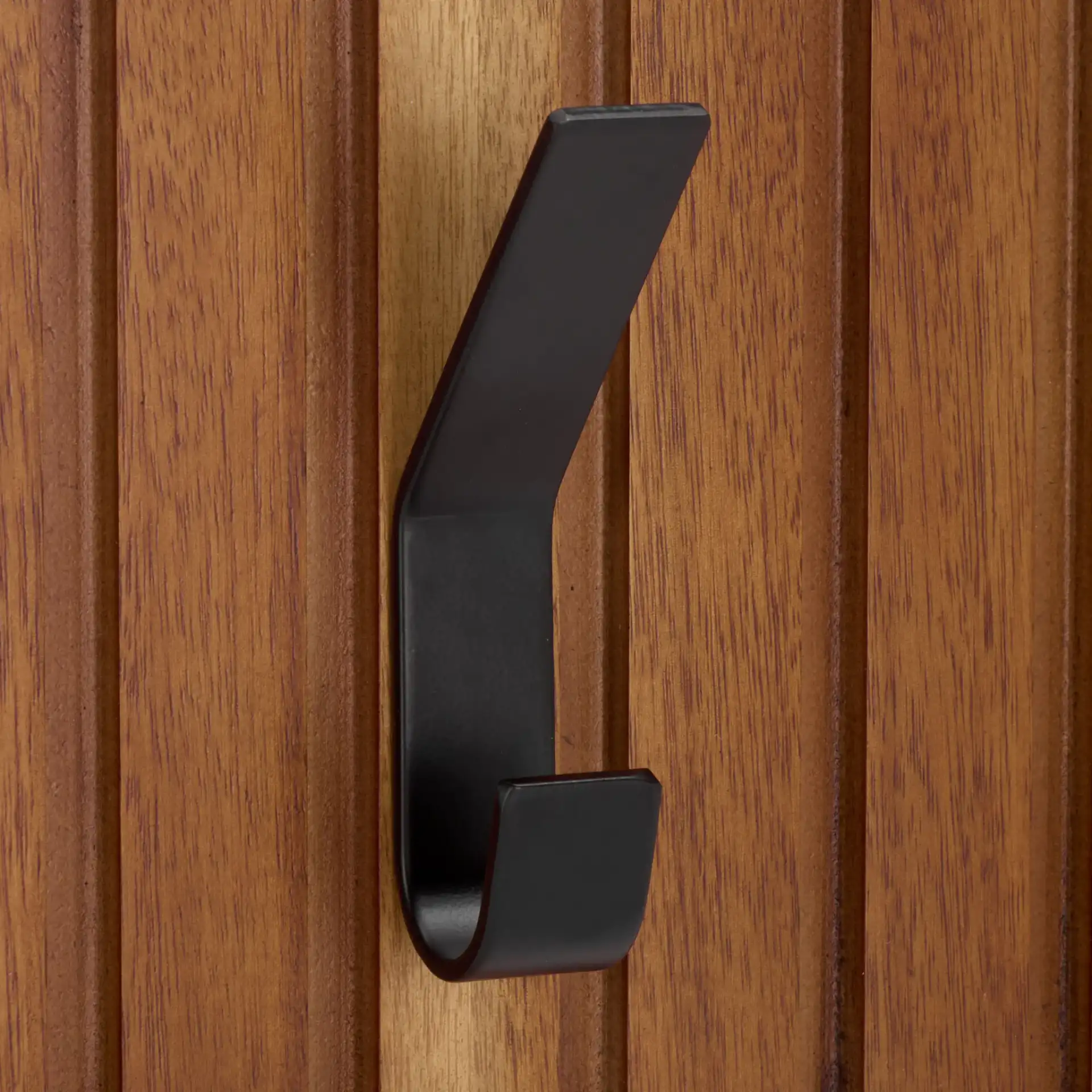 Fraizer Three-Hook Wall-Mounted Coat Rack in Natural Acacia / Black in a styled room