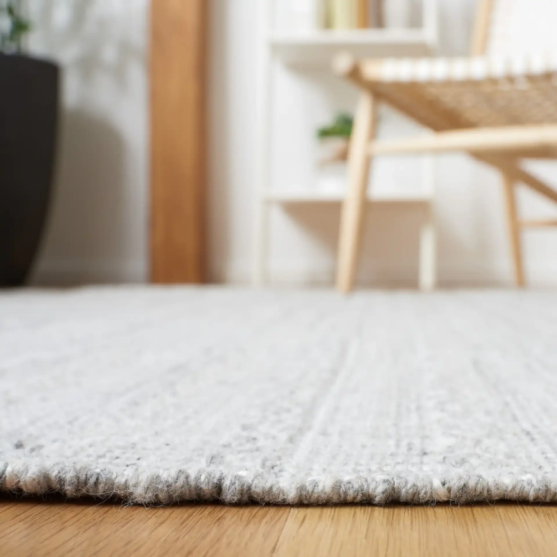 Striped Kilim Tonal Geometric Rug in Gray / Ivory in a styled room