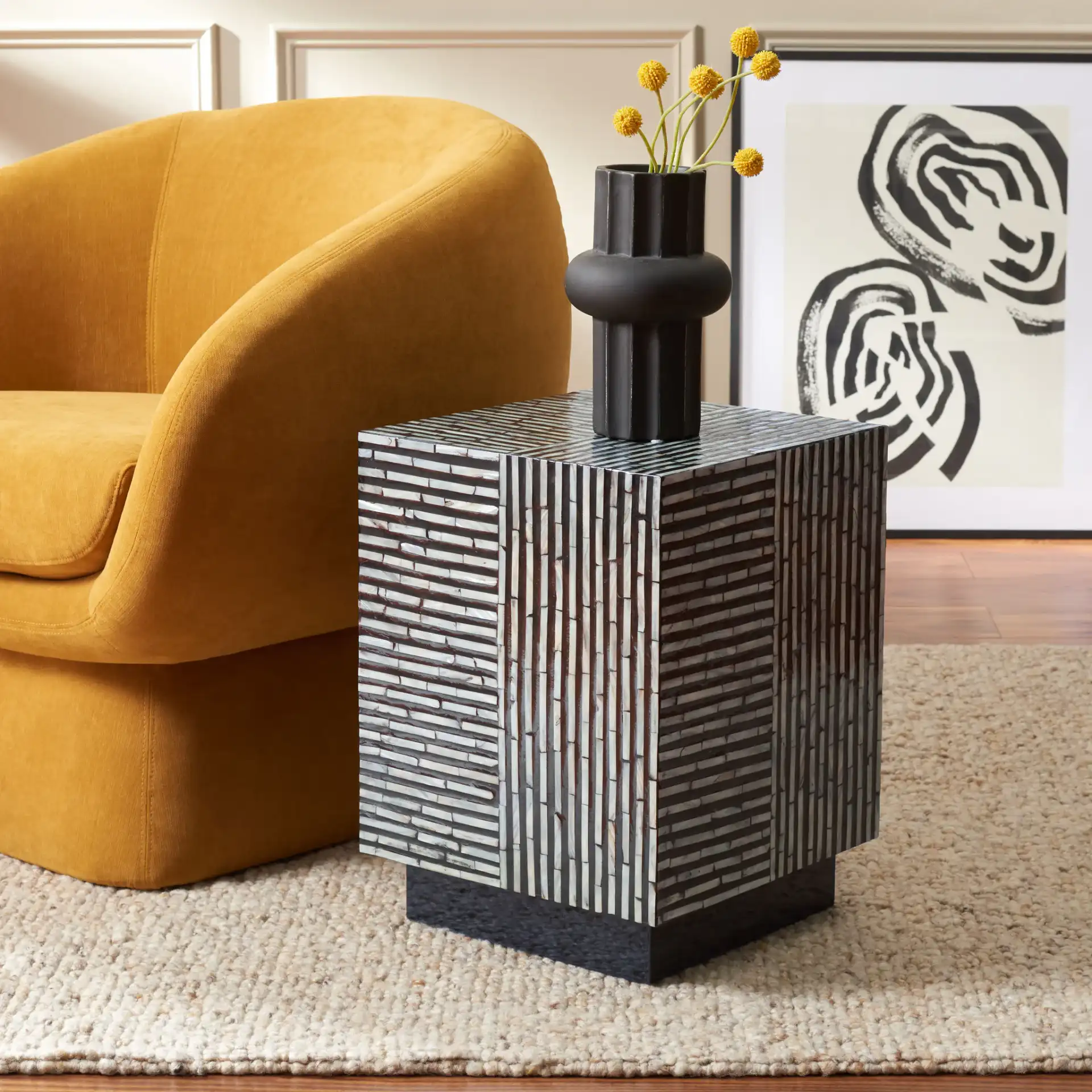 Hamza Square Stool in Multicolor / Black in a styled room
