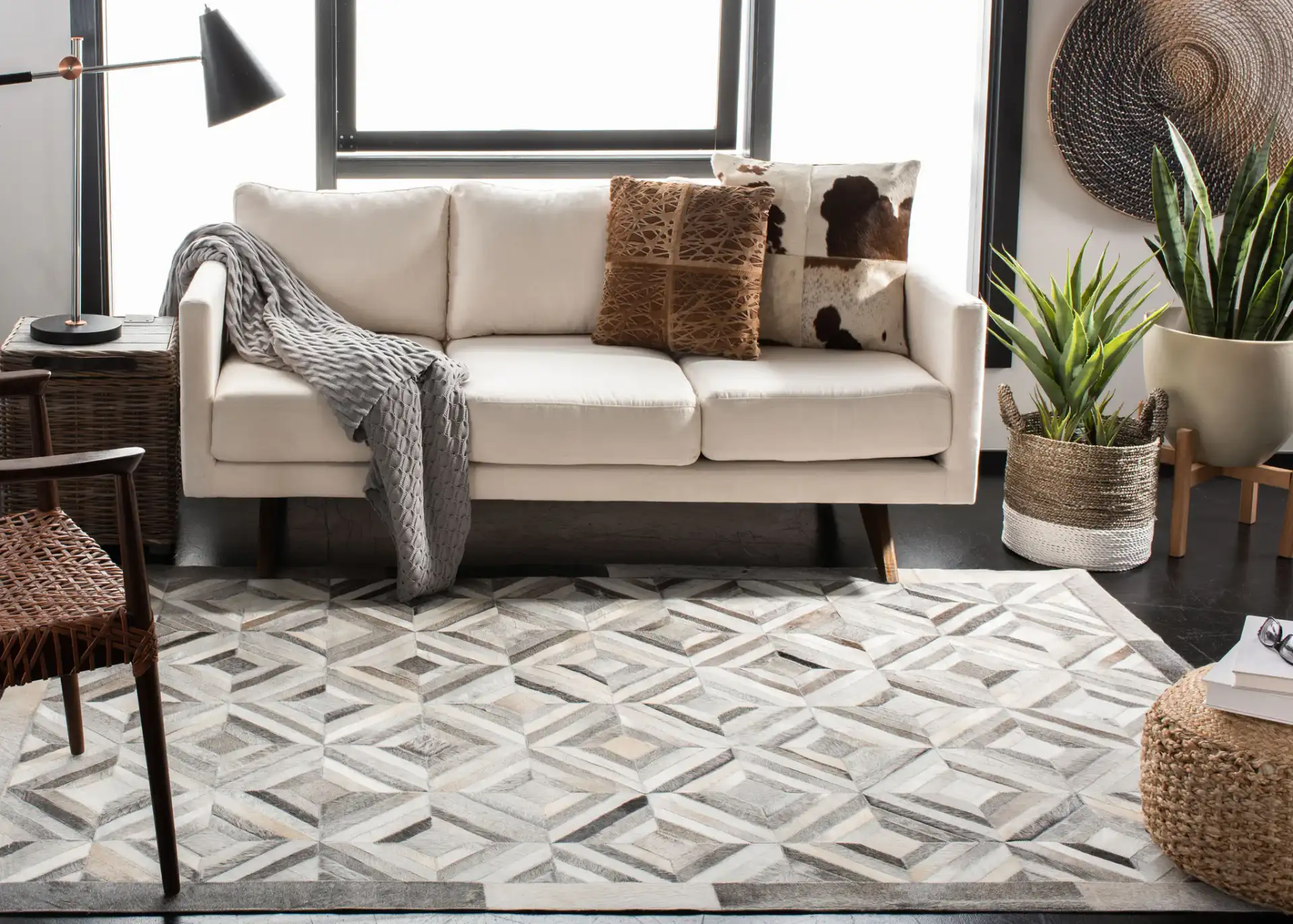 Studio Leather Patchwork Diamond Hand-Woven Rug in Gray in a styled room