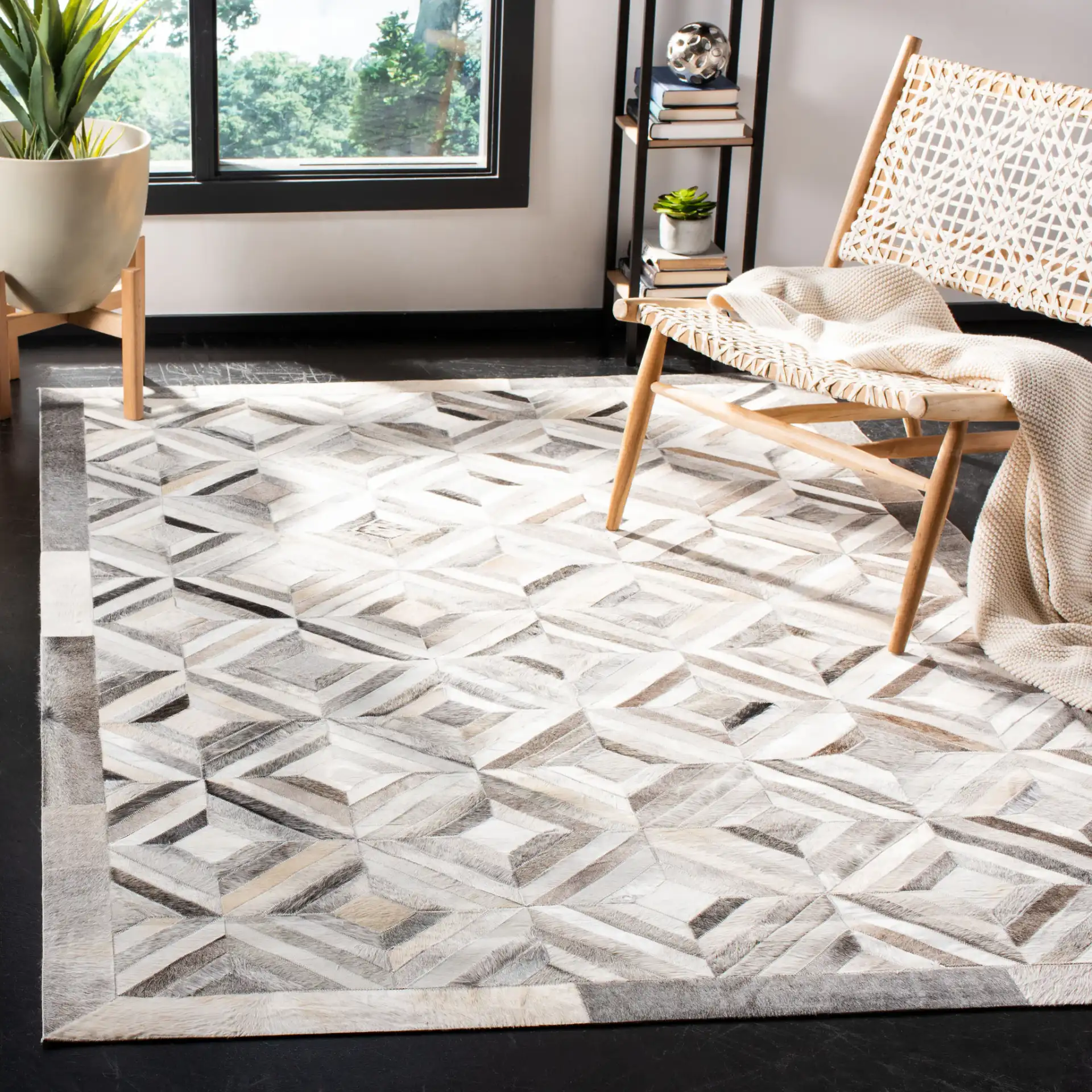 Studio Leather Patchwork Diamond Hand-Woven Rug in Gray in a styled room